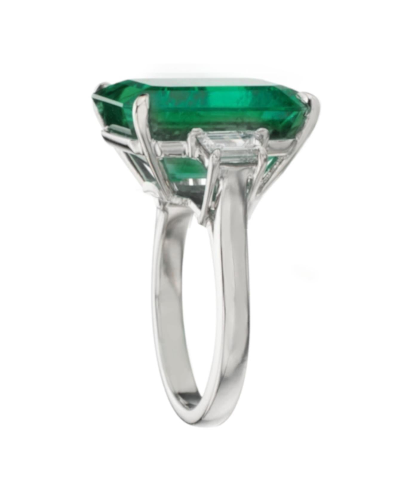 Indulge in the allure of nature's mesmerizing beauty with this distinguished GRS Certified 12 Carat Insignificant Green Emerald White Gold Ring.
Center Gemstone:
At the heart of this exceptional piece is a GRS Certified Insignificant Green Emerald,