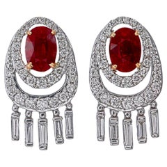 Boucles d
oreilles certifiées GRS de 1.27 carat de rubis birman, sang de pigeon et diamant en 18K WG