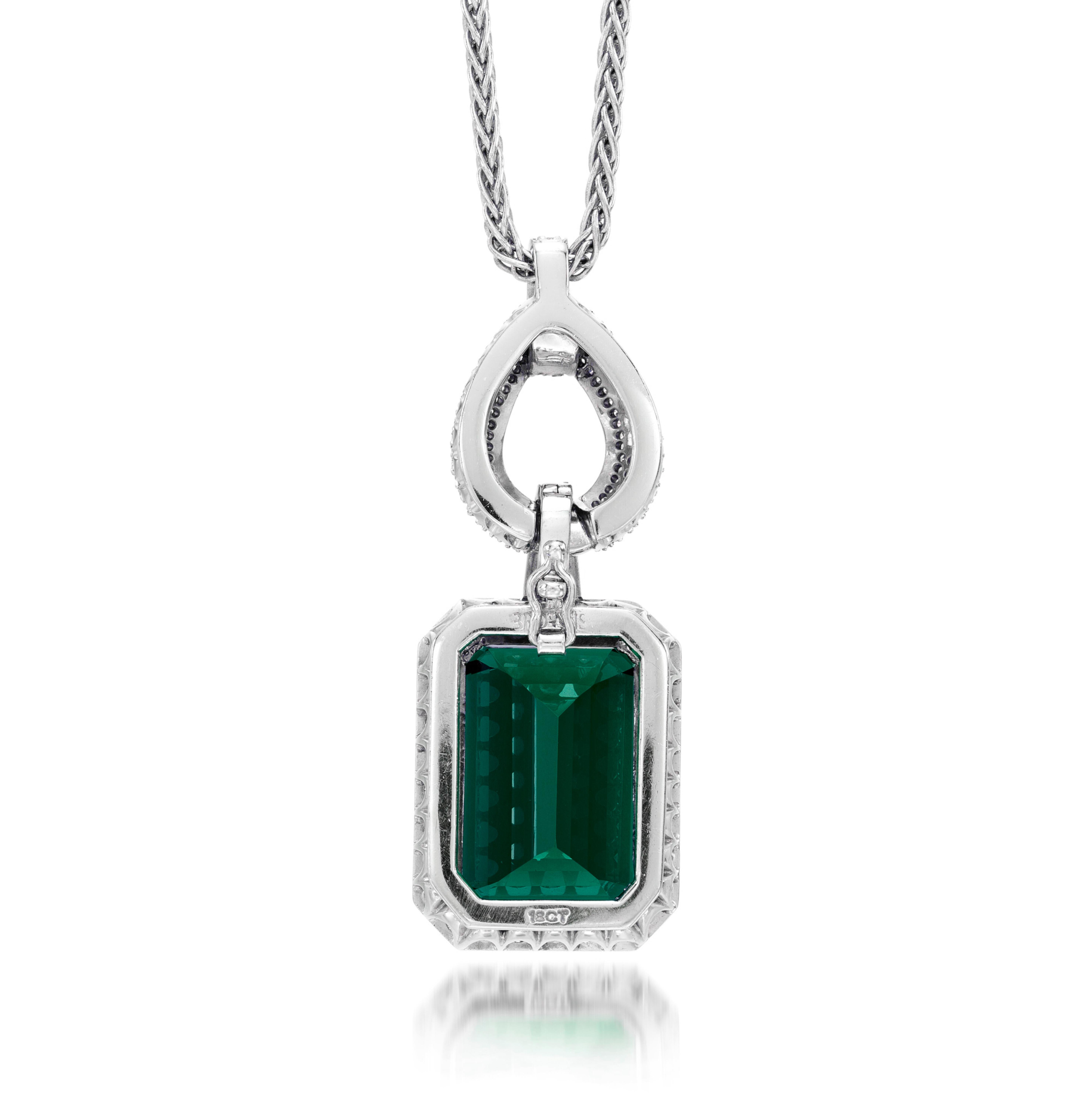Stunning 12.89 Carat GRS Certified Minor Oil Emerald Pendant Necklace

A true masterpiece, this 12.89-carat GRS-certified emerald pendant is delicately set in an elegant design. The emerald, with minor oil treatment, radiates a deep, captivating