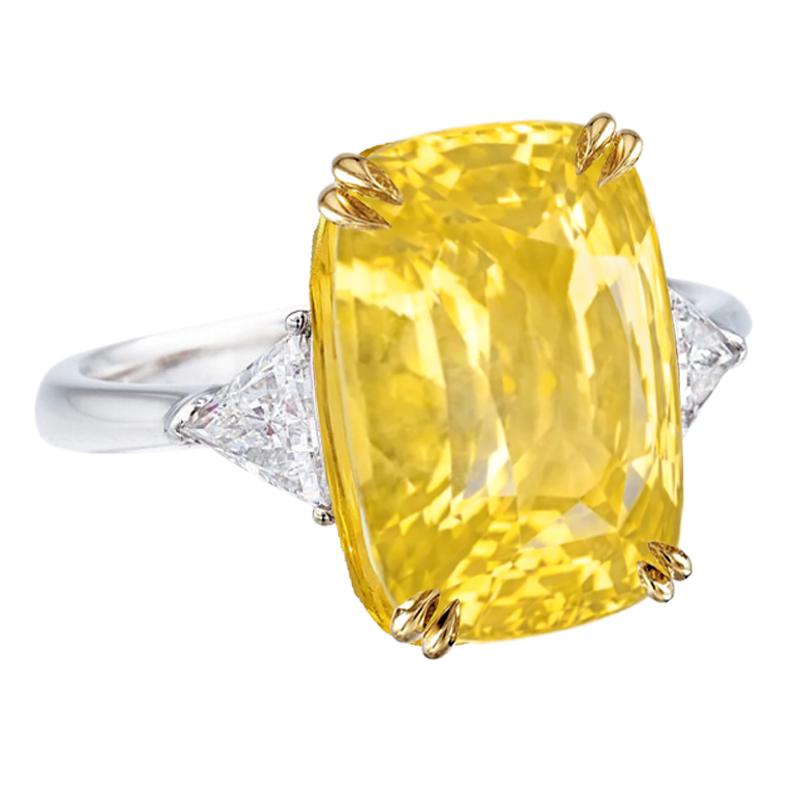 Amazing no heat 13.37 carats Yellow Sapphire emerald cut, flanked by a pair of half moon shaped diamonds. Set this platinum and 18K yellow gold, three-stone ring.
The GRS certificate is attached to the images for your convenience.

Crafted in Italy