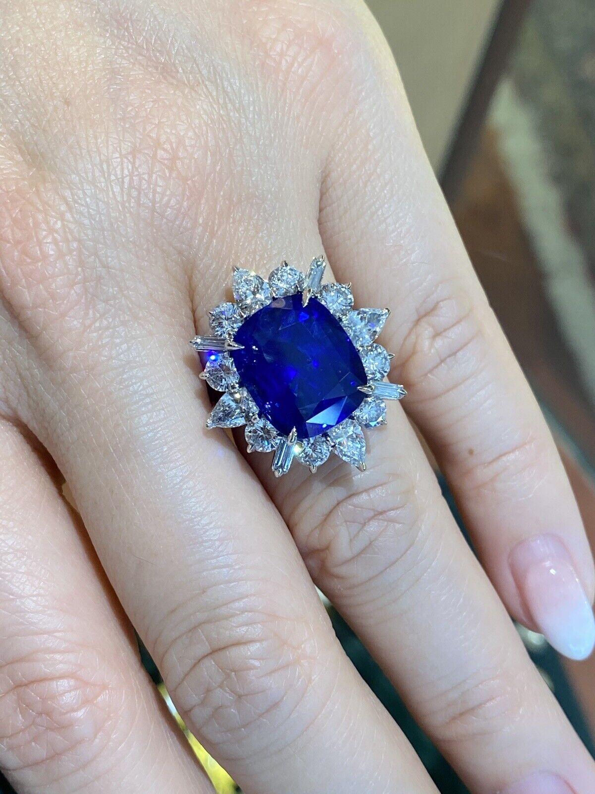 GRS Certified 13.75 ct Royal Blue Ceylon Sapphire in Diamond Platinum Halo Setting
Features
One Cushion Modified Brilliant
Royal Blue Sapphire
weighing 13.75 carats
Vibrant Vivid Blue color
Very clean
Ceylon origin
GRS certification
(*see copy of