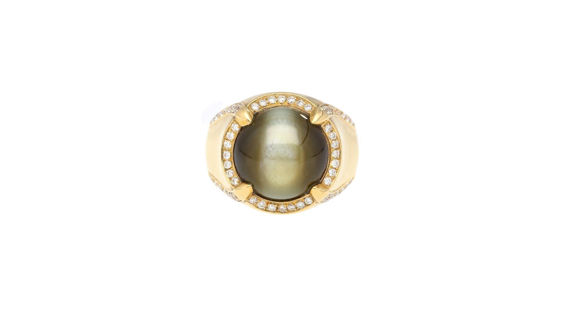 GRS Certified Chrysoberyl Cat's Eye men's ring in 18k solid yellow gold elevated setting. The center stone is a natural mined Chrysoberyl Cat's Eye, cabochon cut and displaying a wide and prominent chatoyancy (star) effect. A gemstone of that carat
