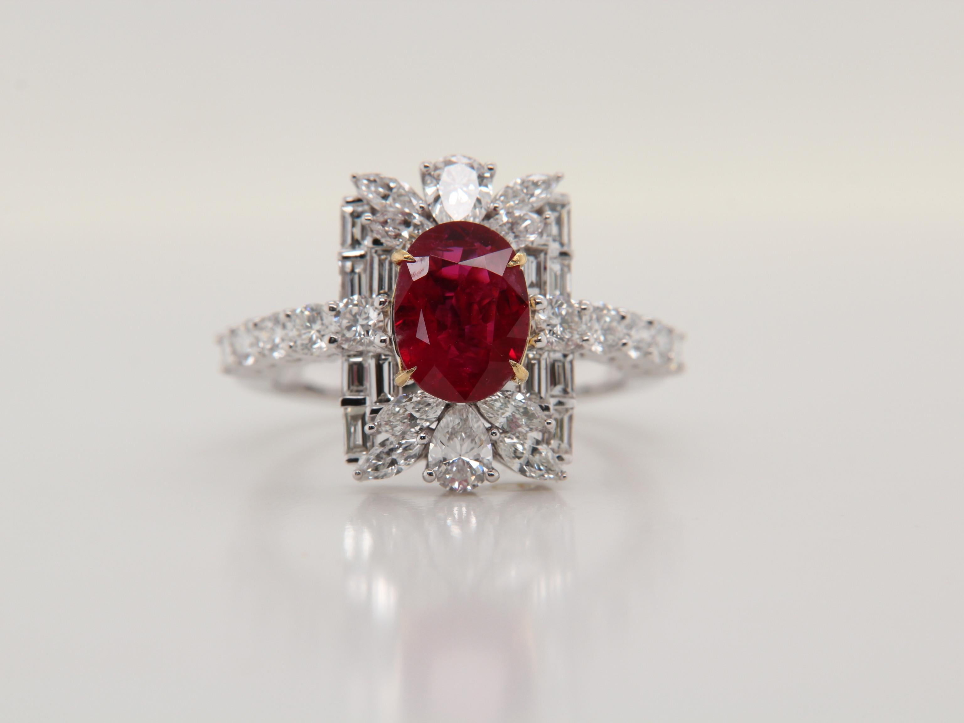 A brand new Burmese ruby and diamond ring by Rewa Jewelry. The mounting is handmade in 18 Karat white gold and set with a 1.43 Carat ruby in the center. The ruby is certified by Gem Research Swisslab as natural, 'Pigeon Blood', and without any heat