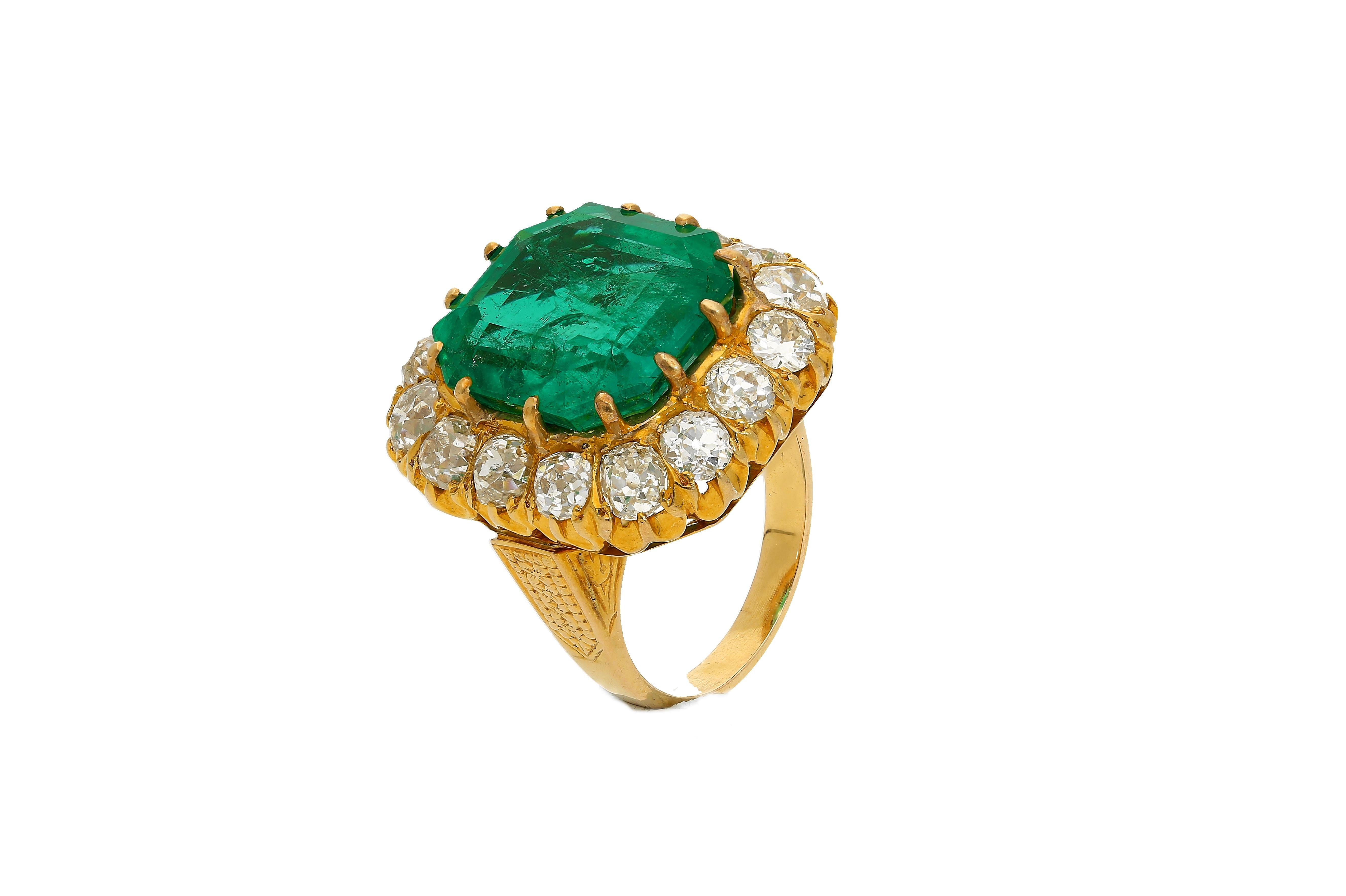 GRS certified natural Colombian Emerald mounted in a vintage art deco ring setting. This legendary Emerald is adorned with a 16 old European cut diamond halo. An Emerald of this size and color is a truly unique find considering its insignificant oil