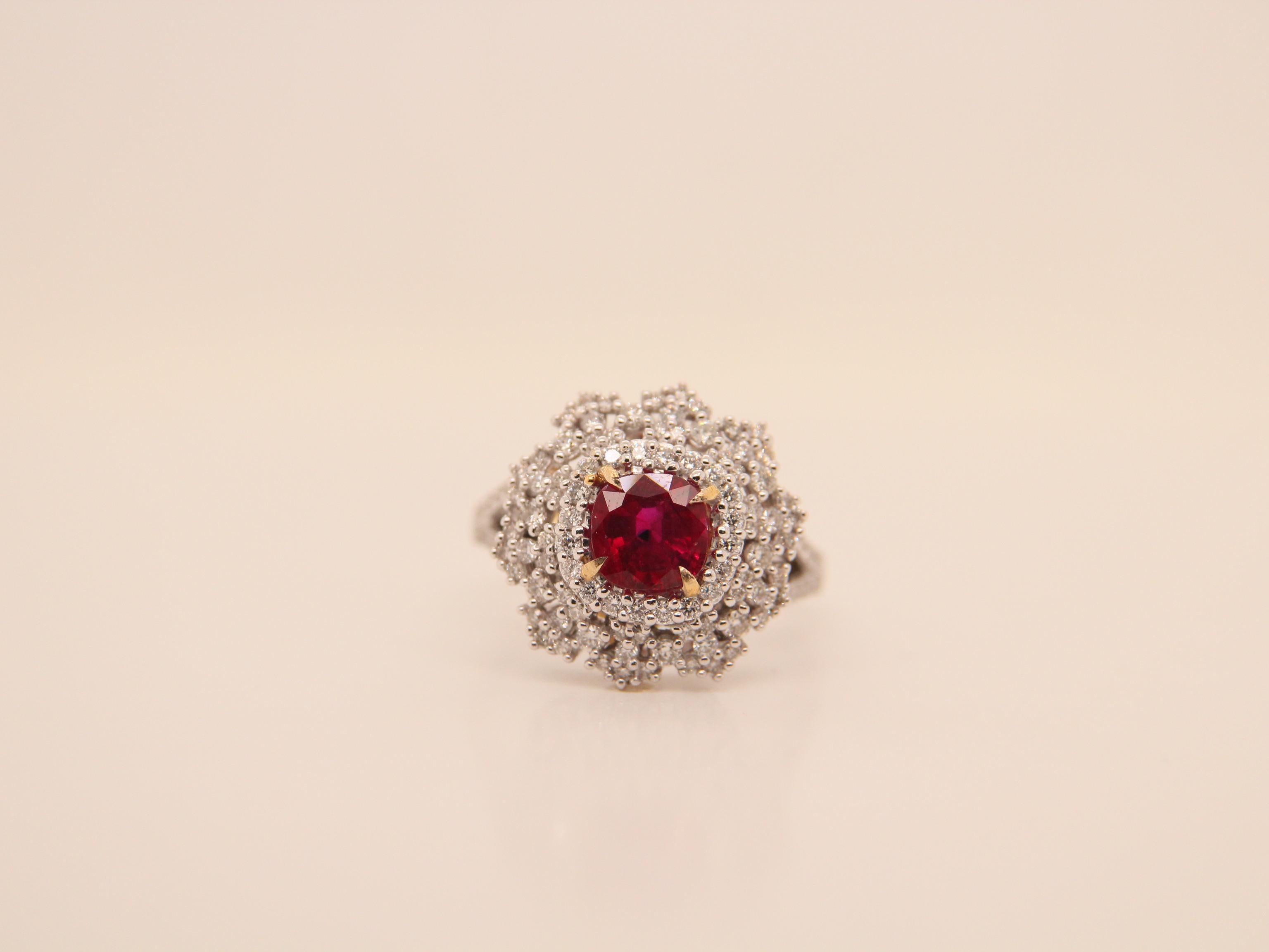 A brand new handcrafted ruby ring by Rewa Jewels. The ring's center stone is 1.49 carat Burmese ruby certified by Gem Research Swisslab (GRS) as natural, unheated, 'Pigeon blood' with the certificate number 2021-110632. The centre ruby has been set