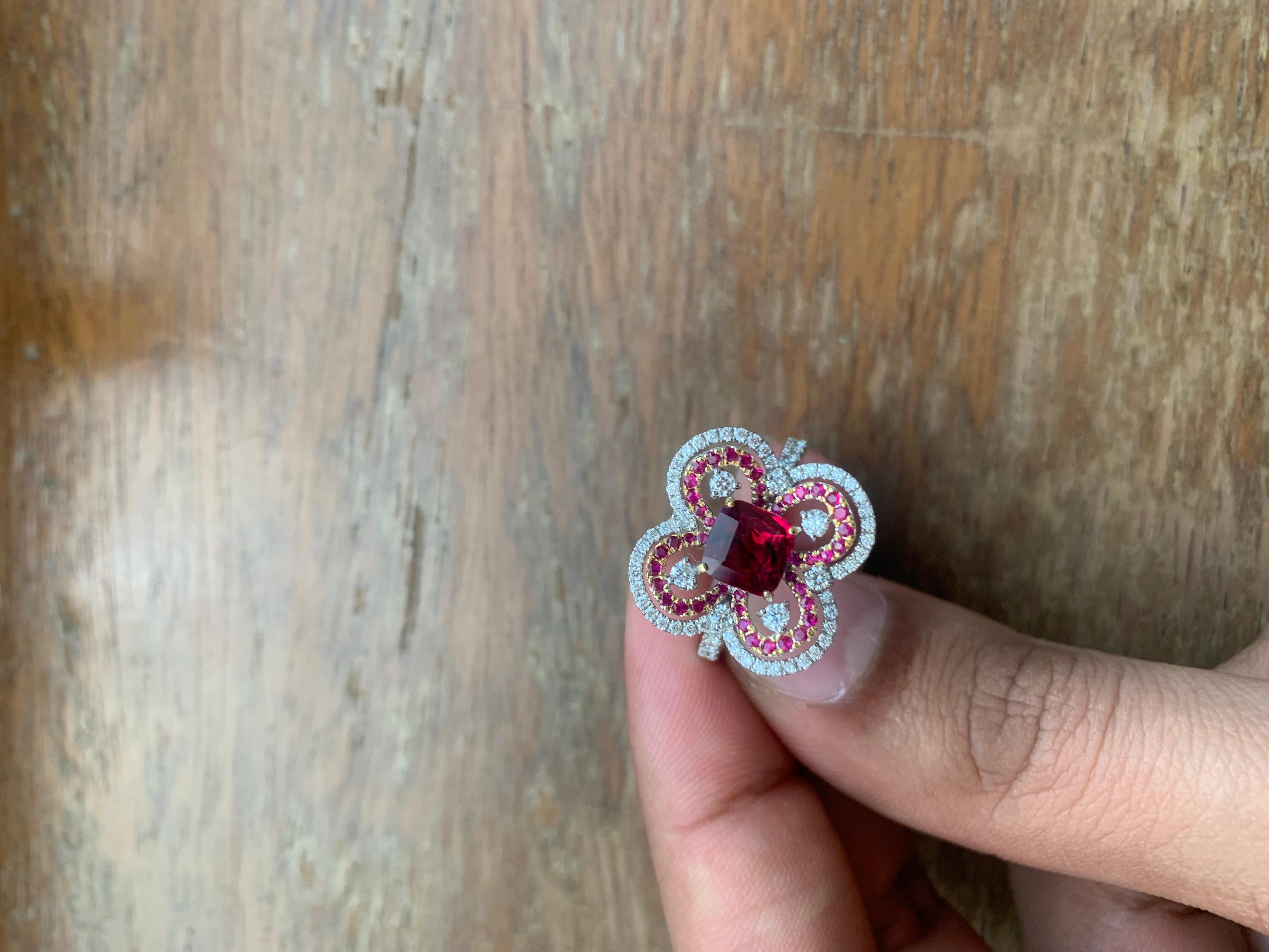 A brand new handcrafted ruby ring by Rewa Jewels. The ring's center stone is 1.50 carat Burmese ruby certified by Gem Research Swisslab (GRS) as natural, unheated, 'Pigeon blood' with the certificate number: 2022-110367. The centre ruby has been set
