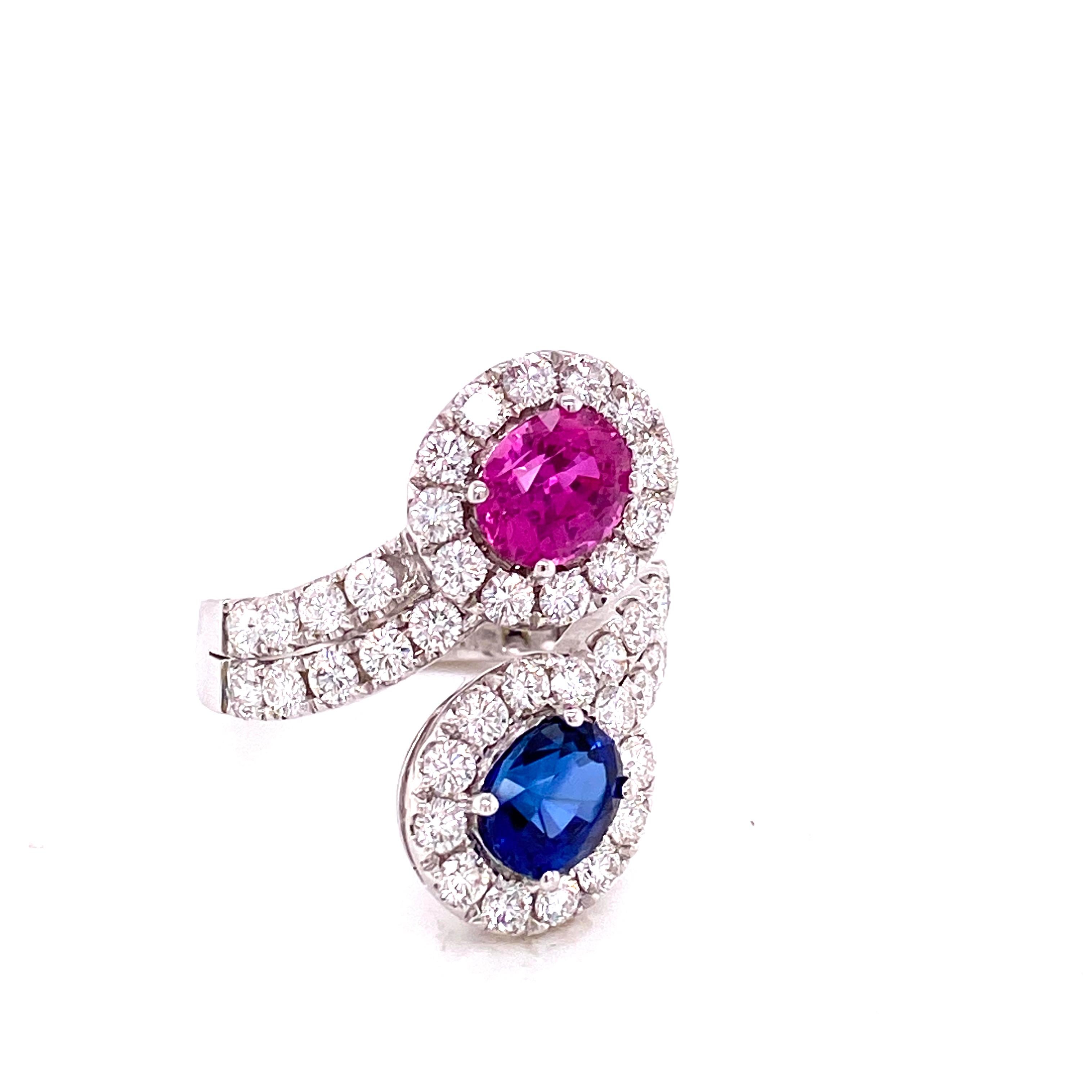 GRS Certified 1.59 Carat Blue Sapphire and 1.54 Carat Pink Sapphire Diamond Ring:

A unique twin ring, it features two gorgeous GRS certified Royal Blue and pink sapphires weighing 1.59 carat and 1.54 carat respectively, accentuated by white round