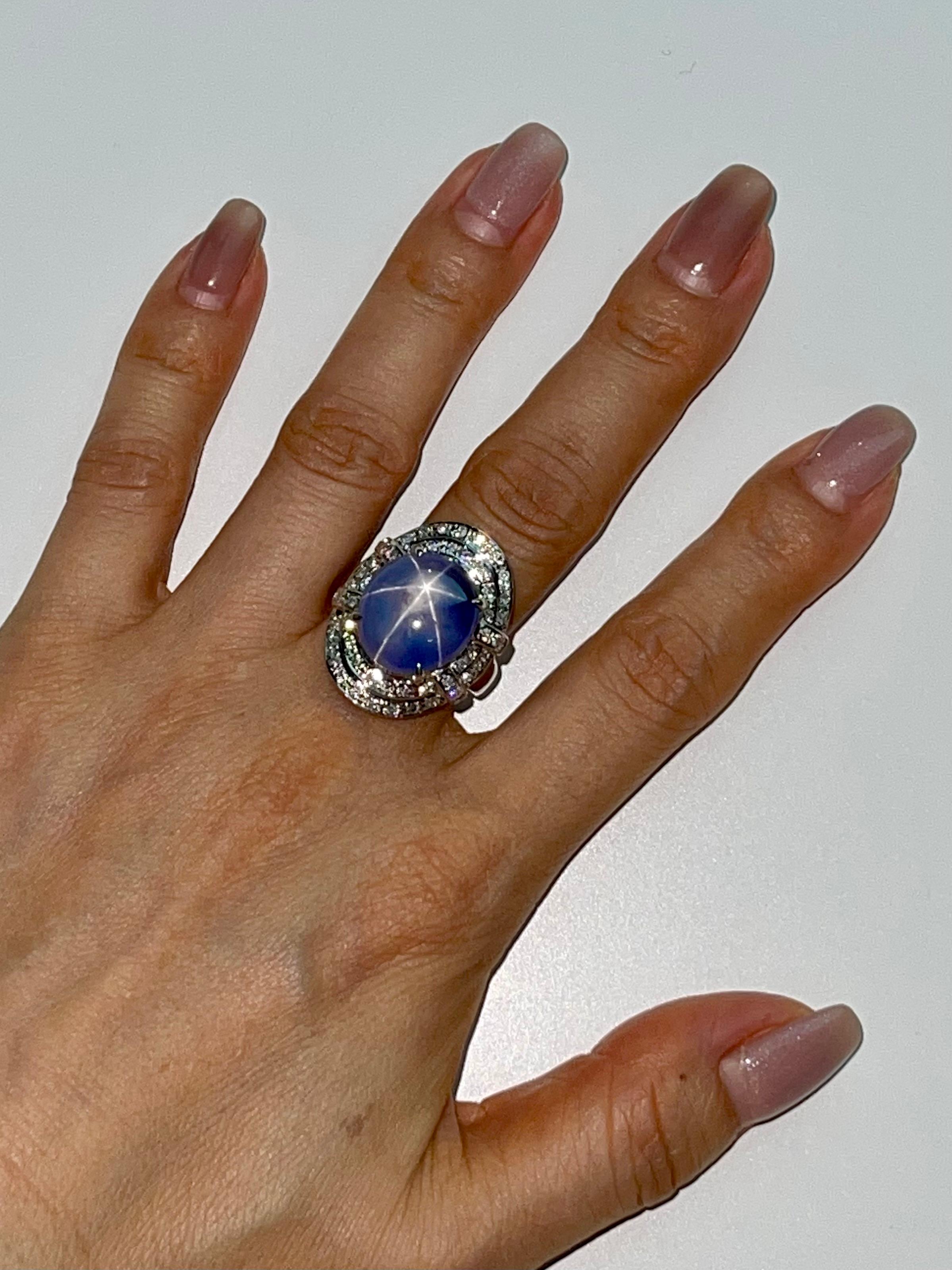 Please check out the HD Video. Here is a superb oversized natural star Sapphire and diamond ring. The ring is set in platinum and diamonds. There are diamonds totaling 0.56 Cts. The star sapphire is impressive in size at over 19 cts. The star