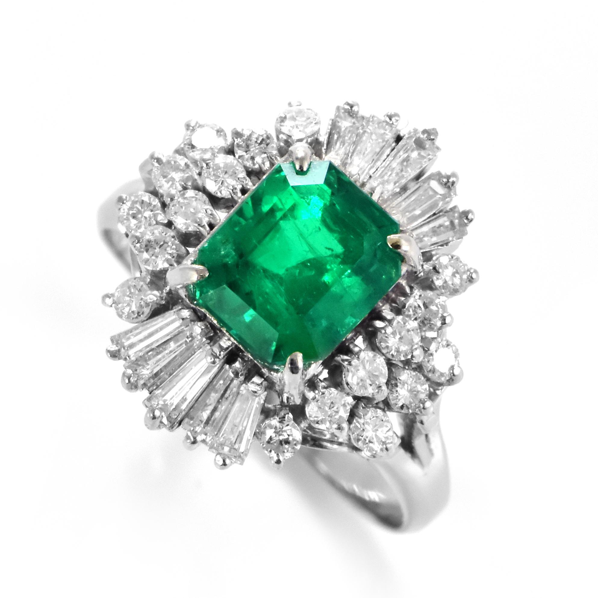 A stunning ring featuring a GRS Certified 1.90 Carat Natural Colombian, Muzo-Green Emerald and 0.77 Carats of Diamond Accents set in Platinum. People have admired emerald’s green for thousands of years. Emeralds have always been associated with the