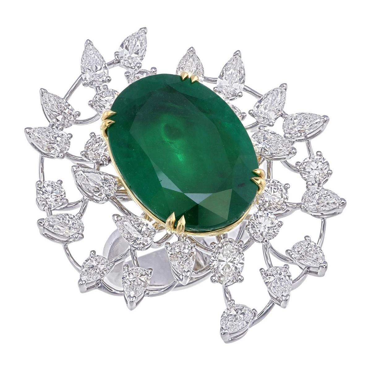 
Introducing the GRS Certified 19.6 Carats Zambian Emerald Cocktail Ring, a pinnacle of elegance and design. At its center is an impressive 19.6-carat Zambian emerald, renowned for its deep green hue and exceptional clarity, certified by GRS for its
