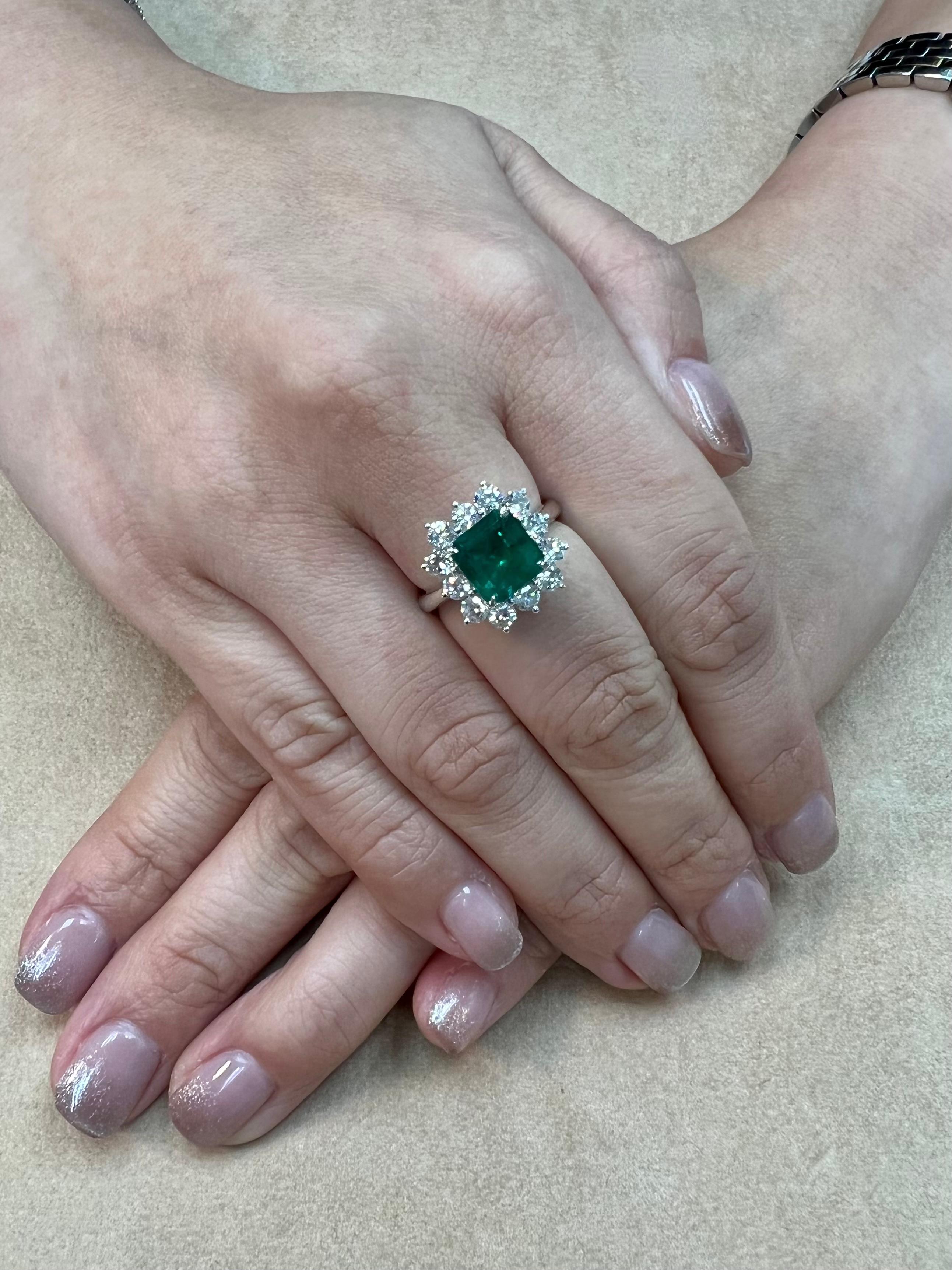 Please check out the HD video. This ring looks much much better in person! This emerald is GRS certified 2.15 cts, insignificant oil. The emerald is impressive enough for GRS to attach a SPECIAL APPENDIX stating its importance! (please see last