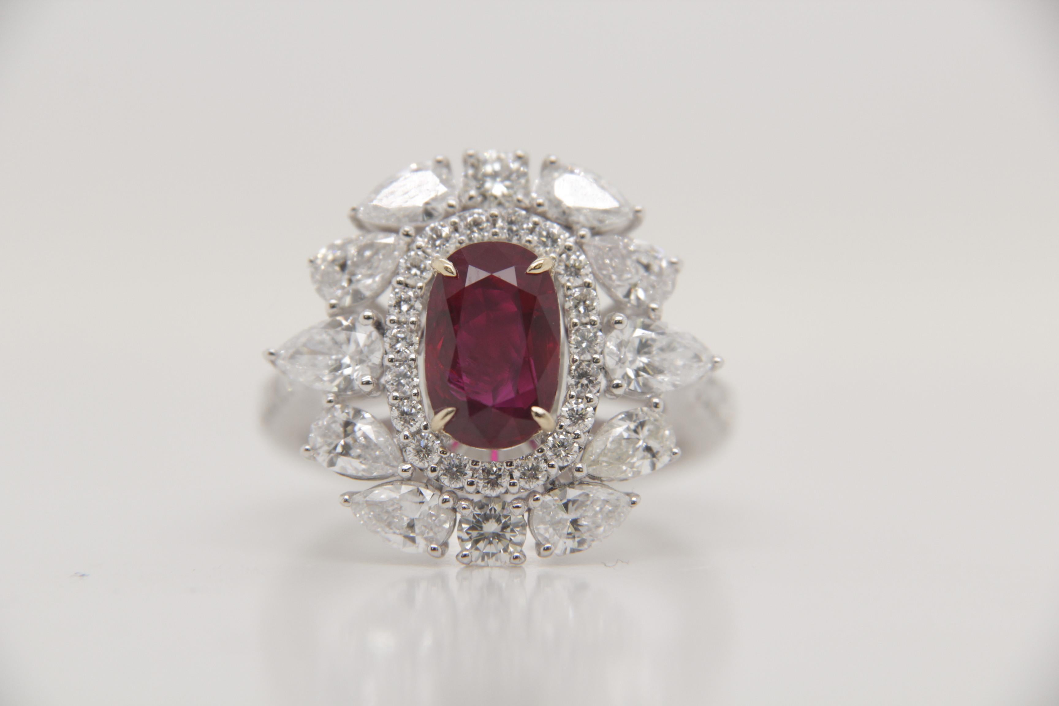 A brand new handcrafted ruby ring by Rewa Jewels. The ring's center stone is 2.04 carat Burmese ruby certified by Gem Research Swisslab (GRS) as natural, unheated, 'Pigeon blood' with the certificate number: 2023-071040. The centre ruby has been set