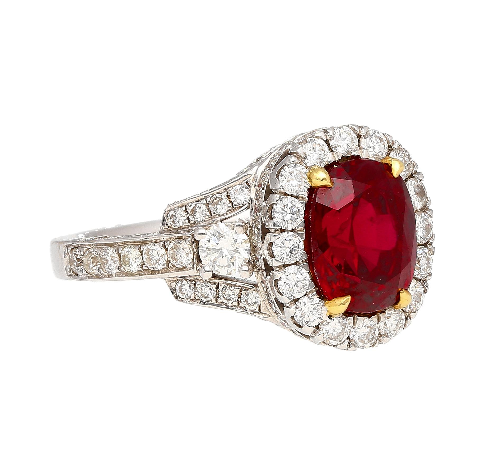 GRS certified 2.20 carat vivid red oval cut natural ruby ring. Crafted in 18K white & yellow gold, this exquisite piece showcases a center ruby of extraordinary Siam origin. 

This ring is unique in it's regal/retro aesthetic. The bezel and ring