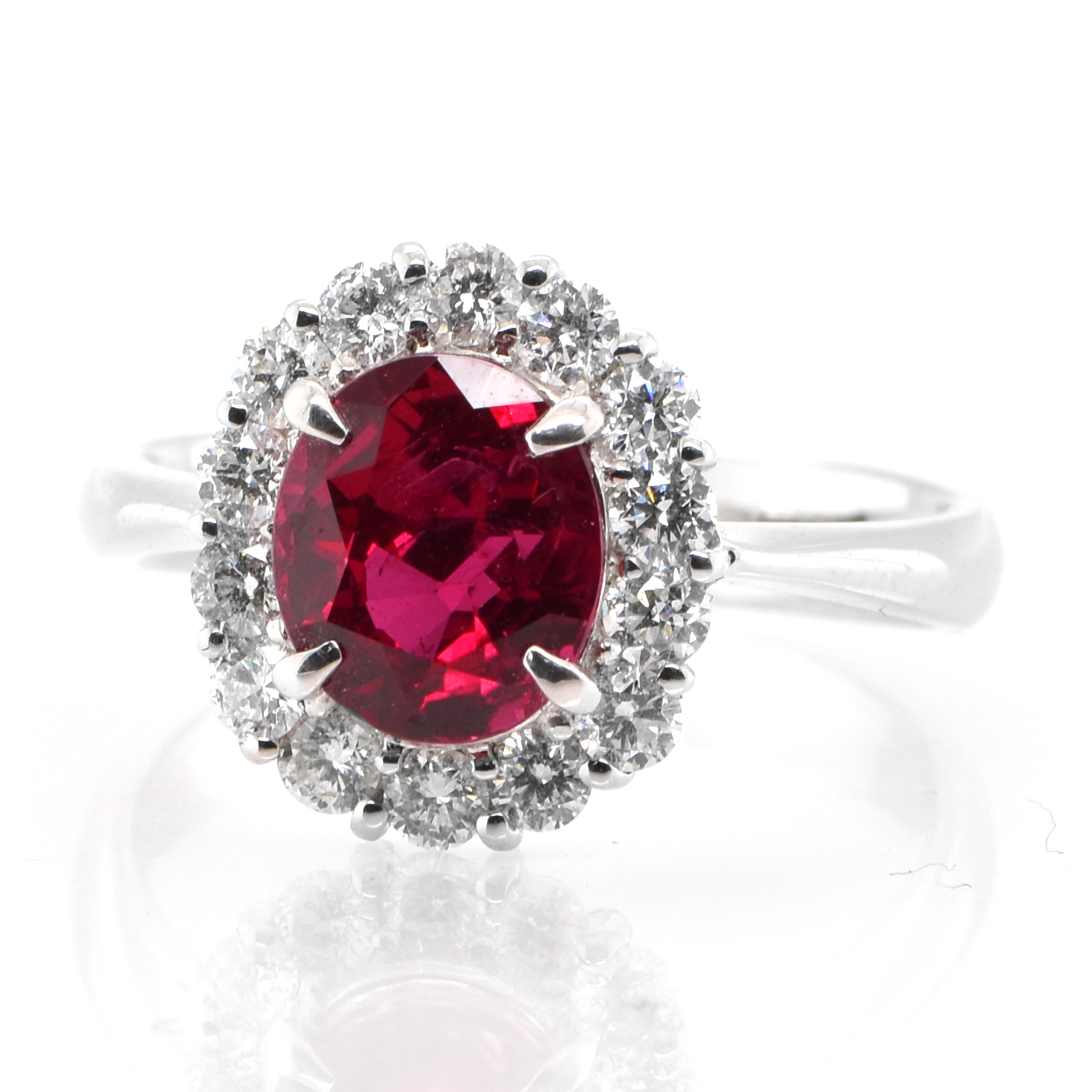 A beautiful ring set in Platinum featuring a GRS Certified 2.33 Carat Natural Vivid Red, Thailand Ruby and 0.61 Carat Diamonds. Rubies are referred to as 