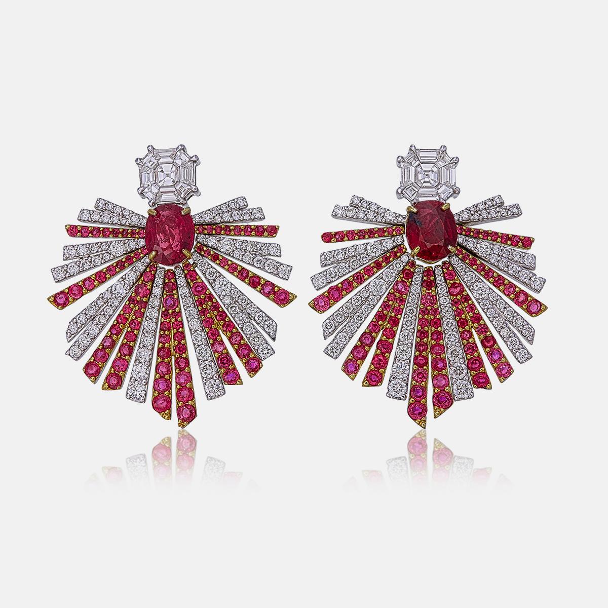 These luxurious earrings showcase GRS-certified Pigeon Blood rubies, totaling 2.36 carats. One earring features a 1.17-carat ruby (Certificate number GRS2021-110698), while the other holds a 1.19-carat ruby (Certificate number GRS2021-110639).