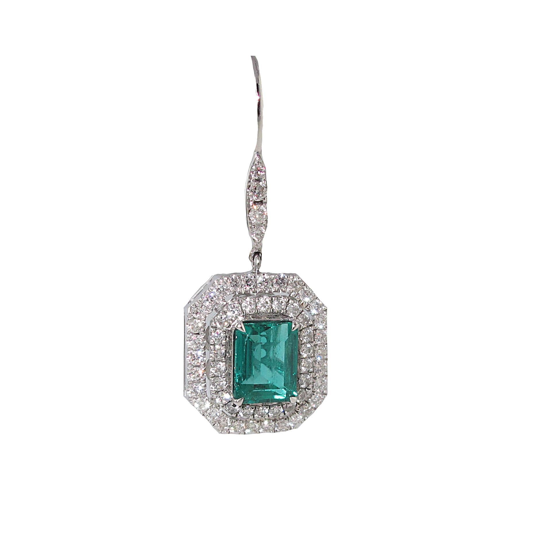 GRS certified, 2.48 carat total weight natural No Oil Columbian Emerald and Diamond drop earrings. Both of the emeralds are GemResearch SwissLab, GRS, certified.
One of the center stones are a 1.32 carat Natural No Oil Columbian Emerald. The