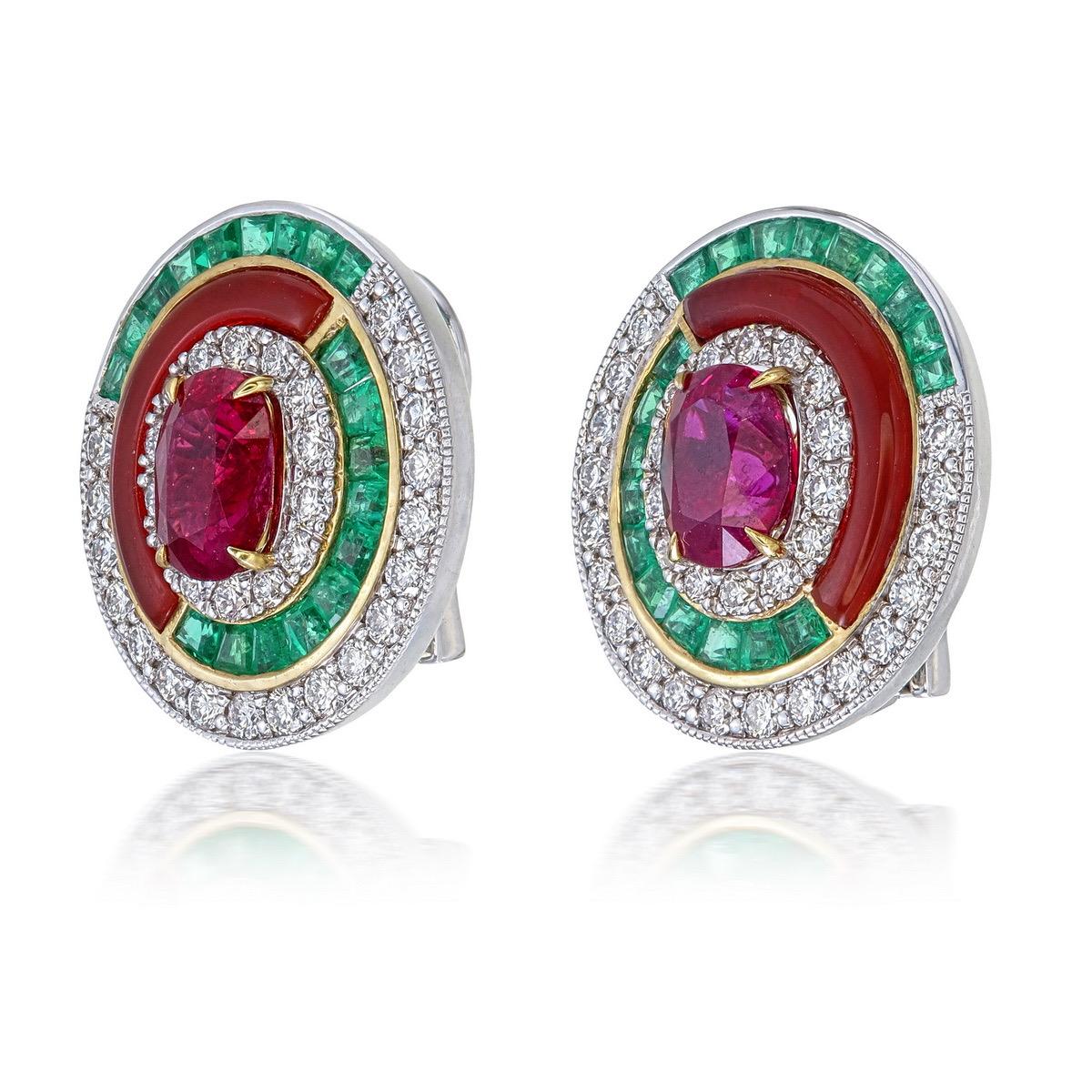 A brand new pair of ruby and diamond earrings from Rewa. The centre stones are natural rubies from Myanmar, Burma, and are certified as No Heat 'Pigeon Blood' from GemResearch Swisslab (GRS). The two rubies weigh 1.34 and 1.16 carats, a total of