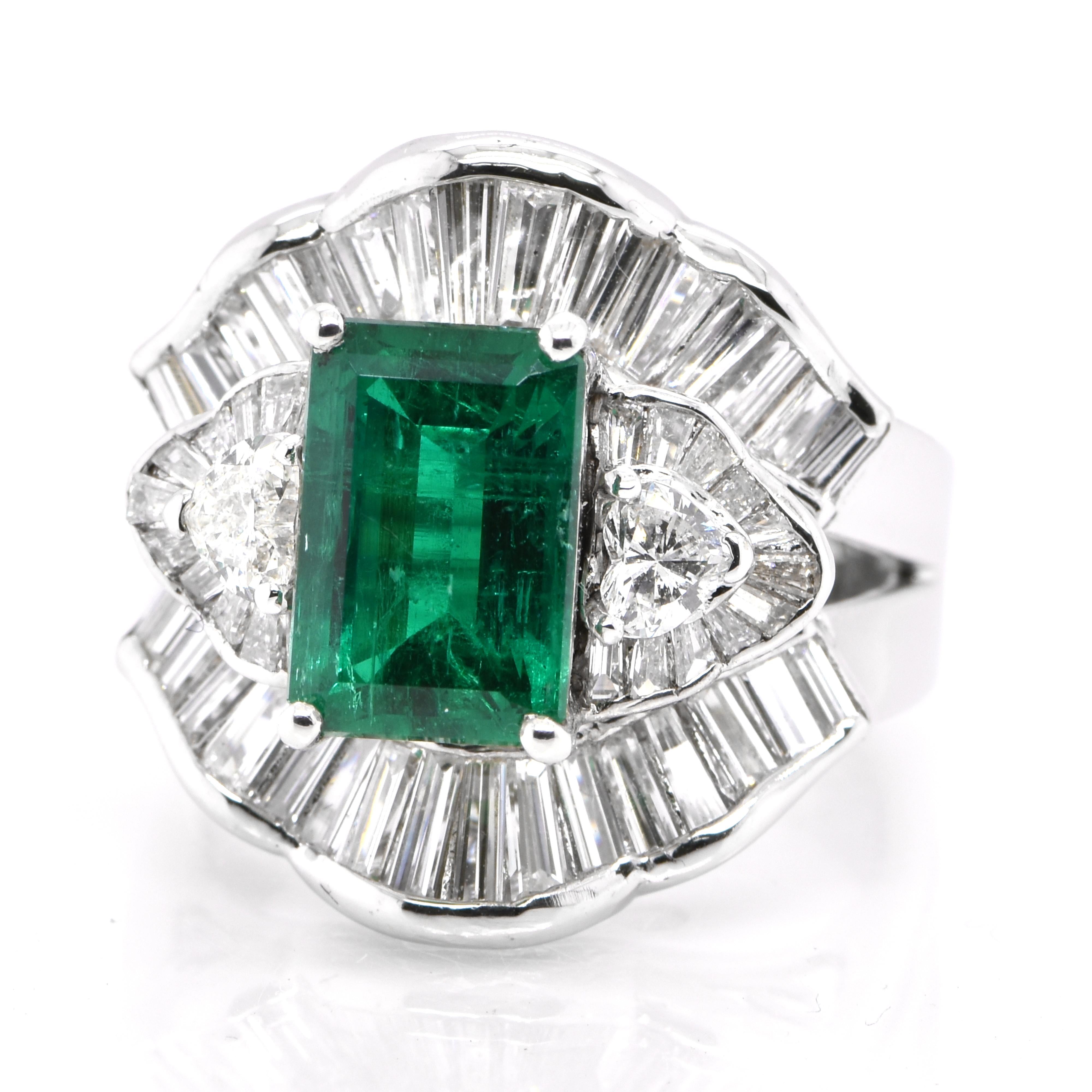 A stunning ring featuring a GRS Certified 2.62 Carat Natural Colombian, Muzo Green, Minor Emerald and Diamond Accents set in 18K Gold. People have admired emerald’s green for thousands of years. Emeralds have always been associated with the lushest