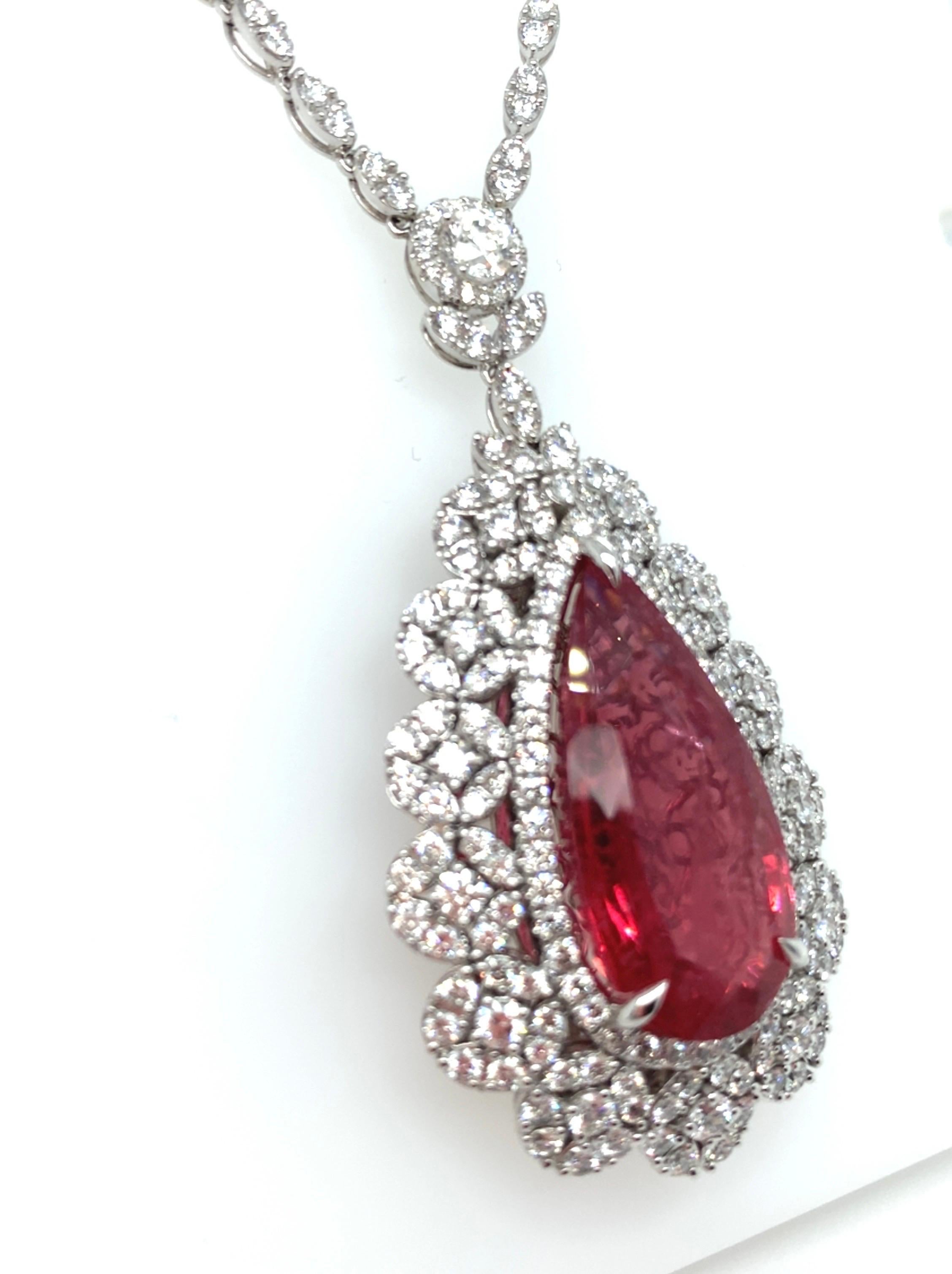 This exquisite GRS Certified 26.22-carat pear-cut pink spinel diamond necklace features a highly coveted Tanzanian spinel, renowned for its rarity and vibrant color. The impressive size of the spinel adds to its exceptional value. Crafted in 18K