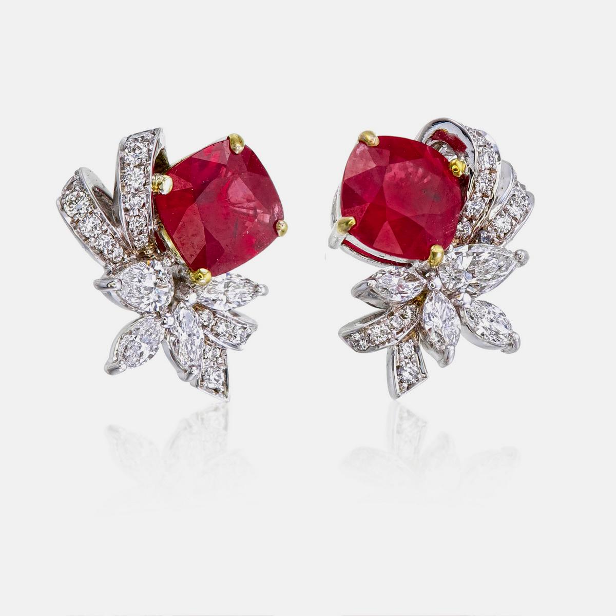 Introducing a brand new handcrafted ruby earring by Rewa Jewels. The earring’s center stones weigh 1.31ct and 1.06ct, are of Burmese origin and certified by Gemological Institute of America (GIA) as natural, unheated, and 'Pigeon blood' for 1 ruby