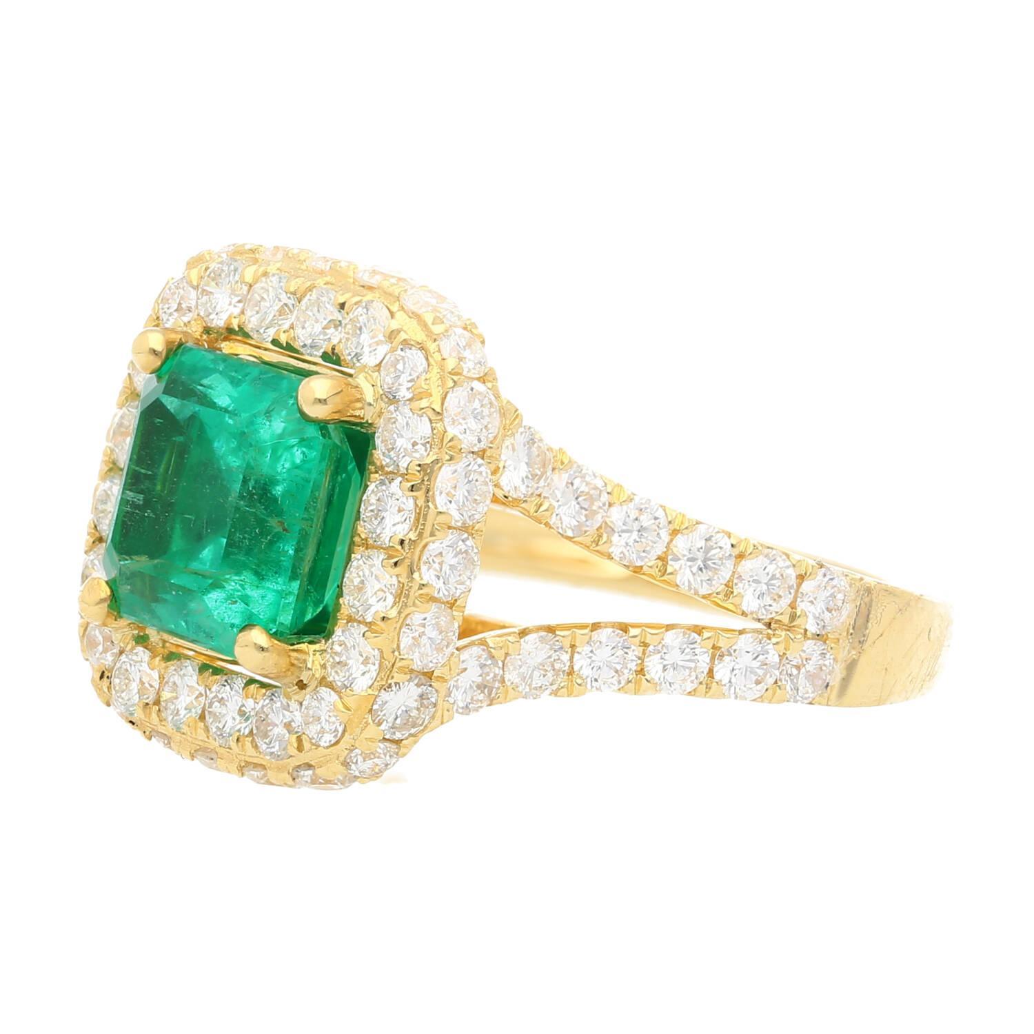 GRS Certified 2.66 Carat Minor Oil Colombian Emerald. Set with a gorgeous round cut diamond halo and diamond set split shank in 18k yellow gold. Offering excellent contrast and symmetry to the already vibrant center stone. 

The center stone is a
