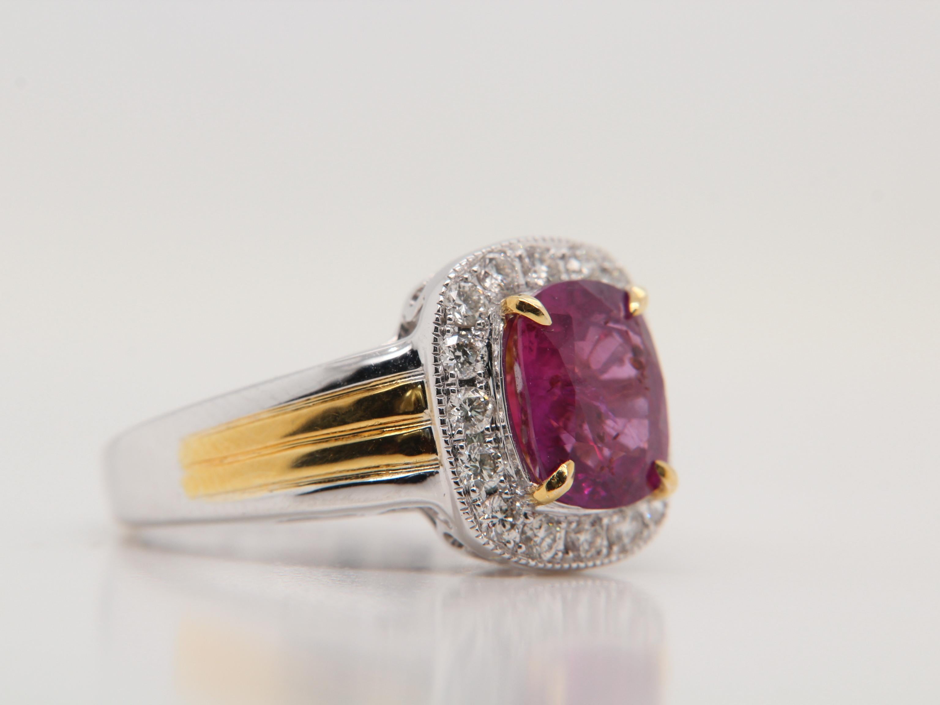 A new 2.98 carat Burmese ruby ring made in 18 Karat gold. The ruby is certified by Gem Research Swisslab (GRS) as natural, unheated, 'Pinkish-Red', and from the mine 'Mogok'. The total diamond weight is 0.47 carats and the total weight of the ring