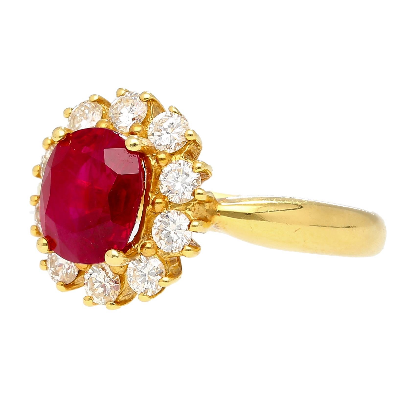 GRS certified 2.99 oval cut Burmese origin unheated ruby and diamond halo ring. Featuring a center stone that's a classic ruby red. The ruby is full of life and brilliance with no inclusions on the surface. Open back ring setting and a wide shank at