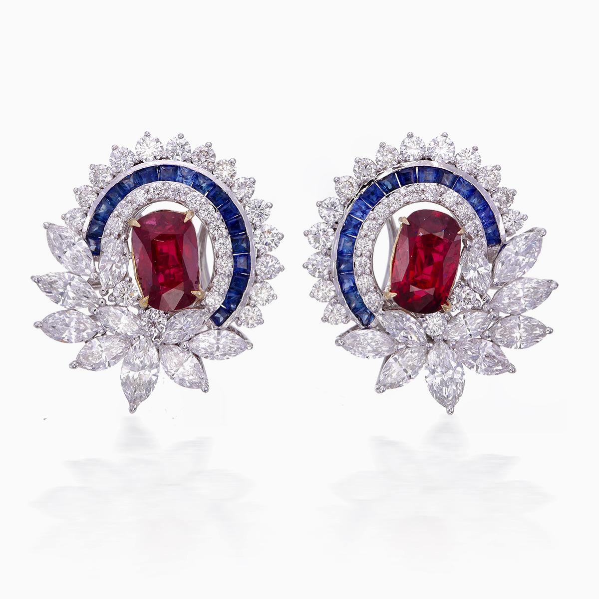 Introducing a brand new pair of ruby and diamond earrings by Rewa Jewels. These earrings have been inspired by traditional Art Deco themes through it's colorful stones and traditional shaped such as rounds, baguettes, and pears.

The center stones