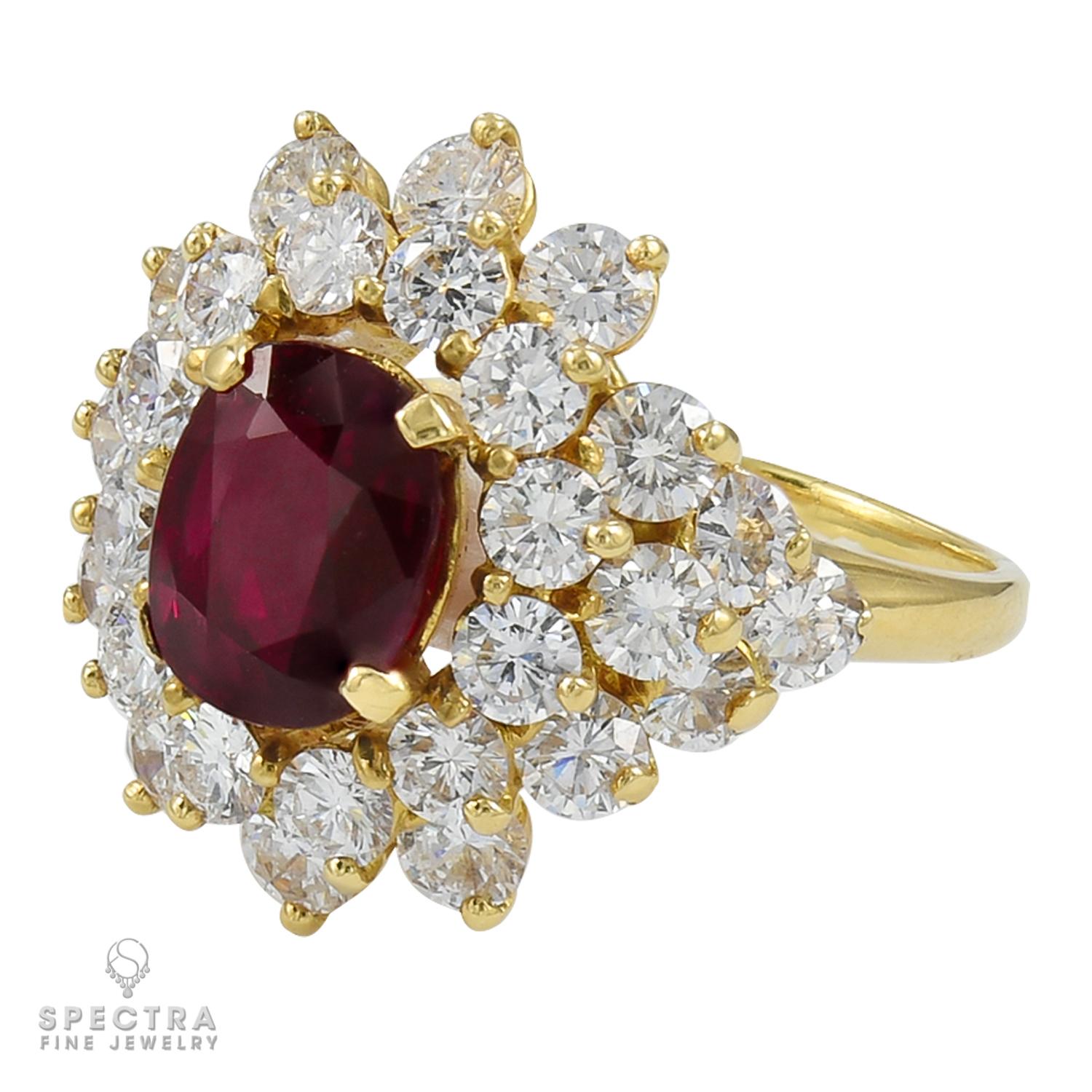 A fancy cocktail ring featuring a 3.01 carat cushion-shaped ruby, surrounded by 30 round diamonds.
The ruby is certified by GRS (Gemresearch Swisslab) stating that the stone is of Thailand origin with the indication of heating.
The diamonds are