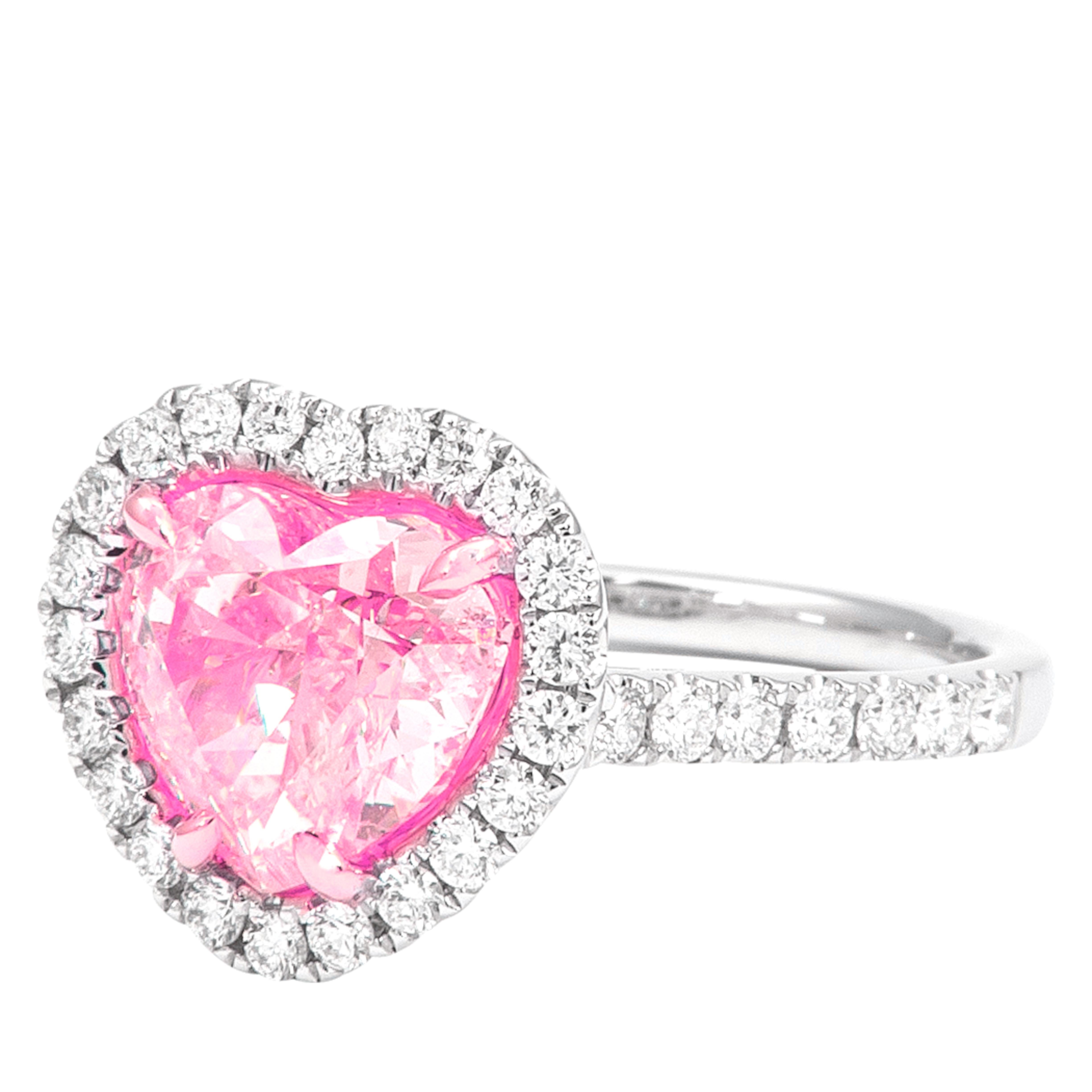 A timeless creation by Cecile Blake, this exquisite ring showcases a vibrant 3.14 carat natural fancy light purple pink diamond certified by GIA with untreated status. 

The heart cut diamond is elegantly surrounded by a halo of  brilliant round