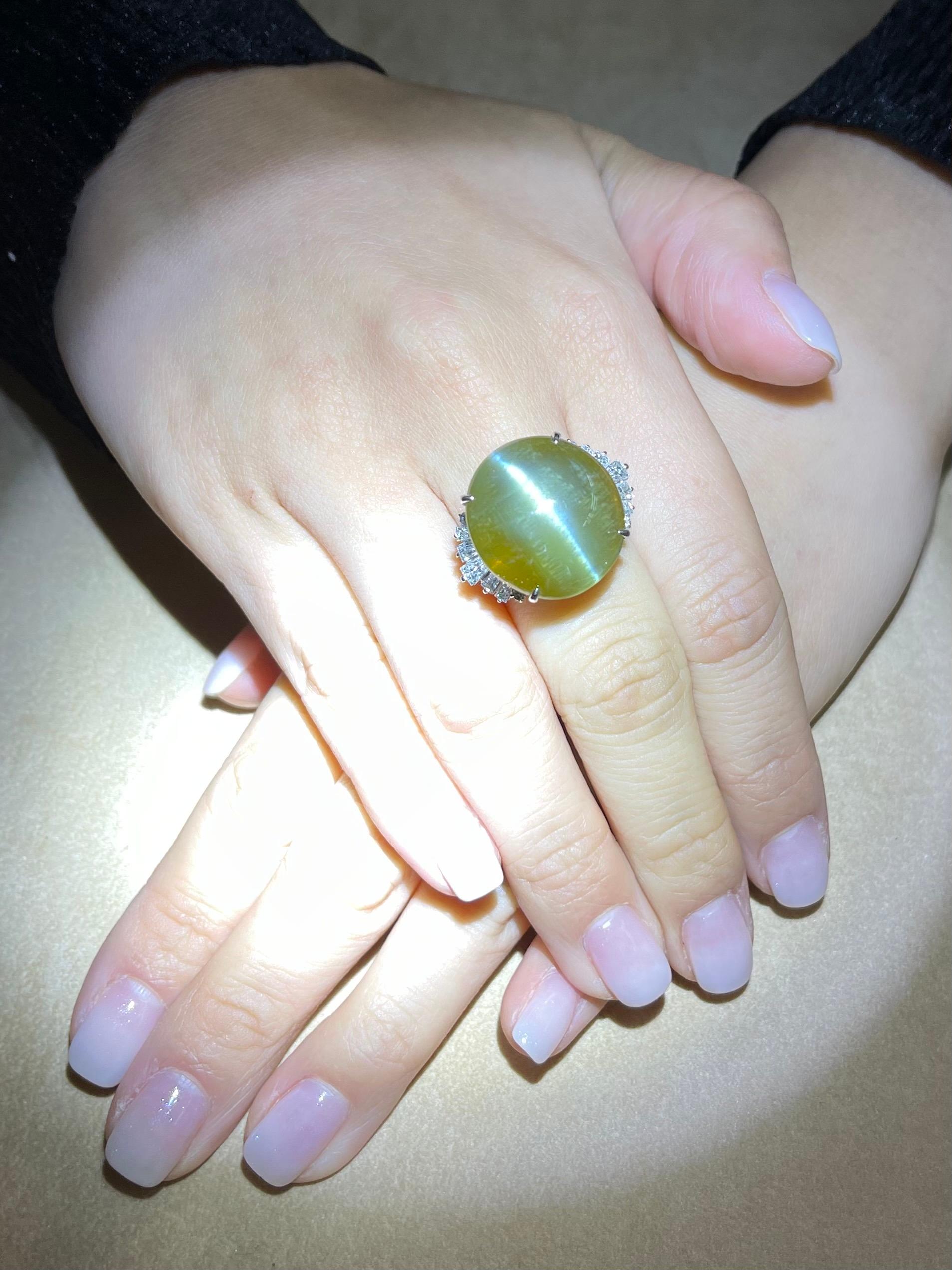 Please check out the HD video. Here is a GRS certified natural cat's eye chrysoberyl. It exhibits strong chatoyancy or cat's eye effect. The honey yellowish green color is also highly sought after. It is certified no heat treatment. The setting is