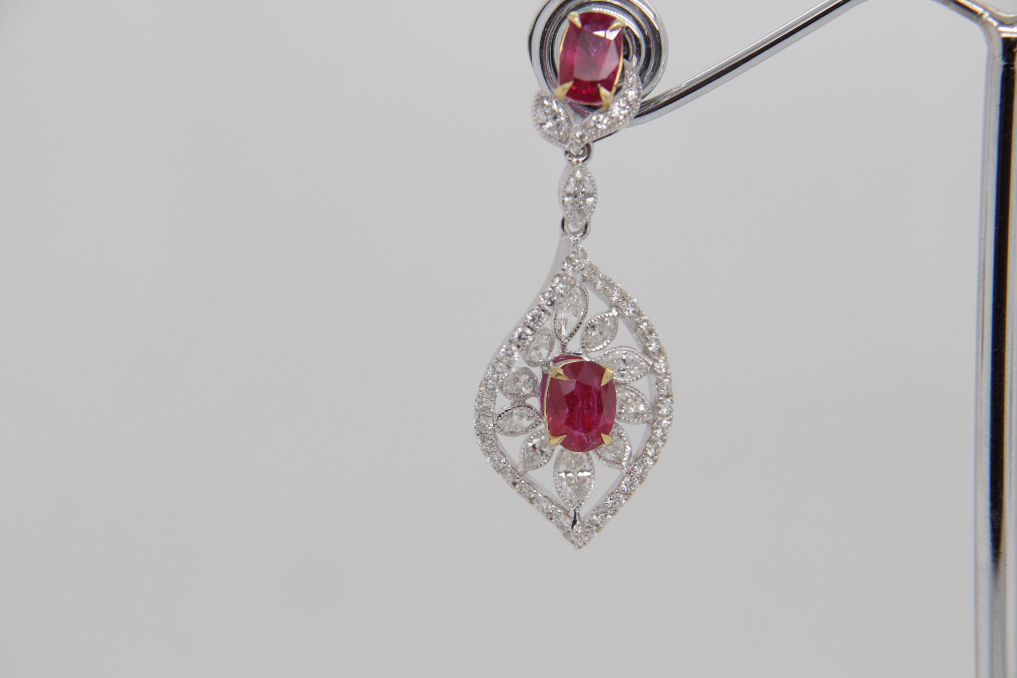 A brand new handcrafted ruby earring by Rewa Jewels. The earring’s center stones weigh 1.13ct and 0.79ct, are of Burmese origin and certified by Gem Research Swisslab (GRS) as natural, unheated, 'Pigeon blood' with certificate numbers 2022-010524