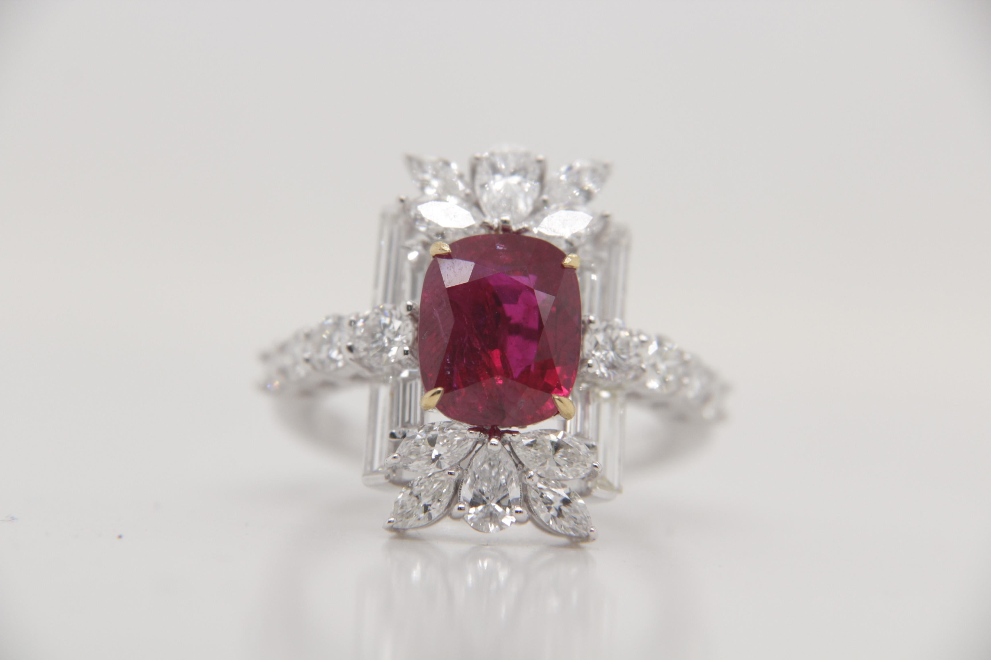 A brand new handcrafted ruby ring by Rewa Jewels. The ring's center stone is 3.38 carat Burmese ruby certified by Gem Research Swisslab (GRS) as natural, unheated, 'Pigeon blood' with the certificate number: 2023-101135. The centre ruby has been set