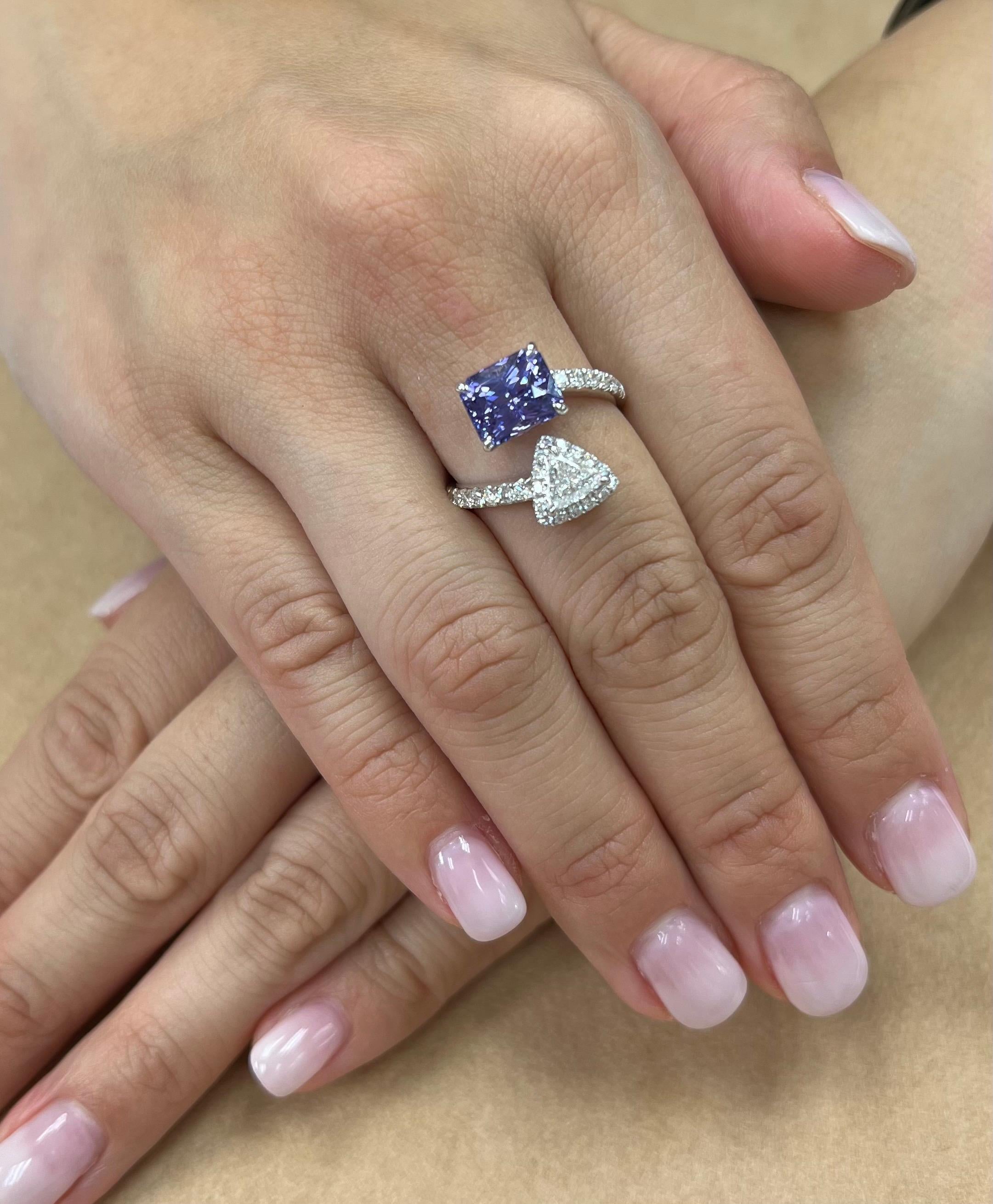 Certified by GRS Swisslab......Here is a super nice natural violet sapphire 3.54 carats from Sri Lanka (Ceylon) and diamond cocktail ring. The ring is set in 18k white gold. One triangle diamond 0.50Cts and 0.43Cts of round diamonds totaling 0.93