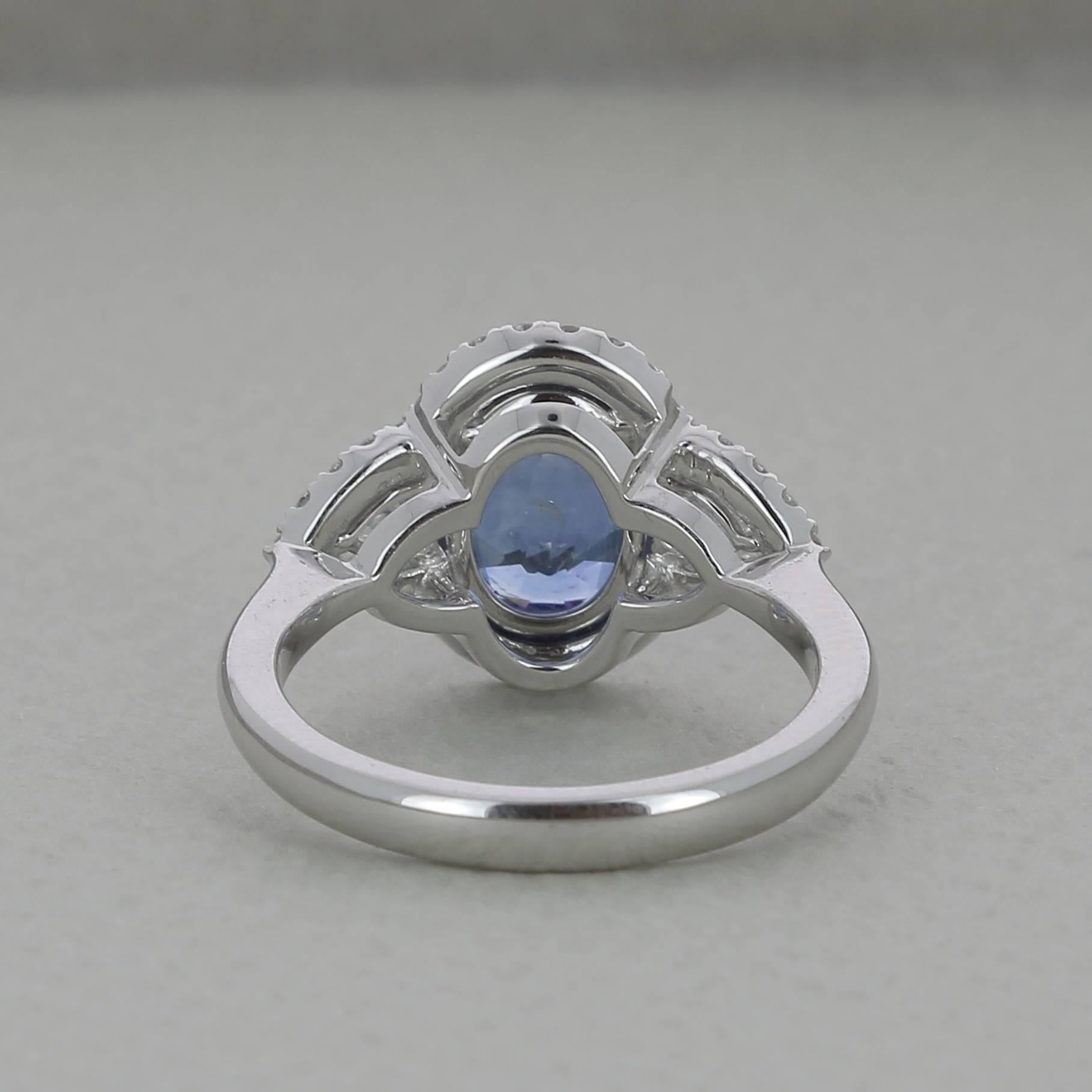 Contemporary 3.18 Carat Oval Natural Blue Sapphire Cocktail Ring Pear/Round Diamonds 18K Gold