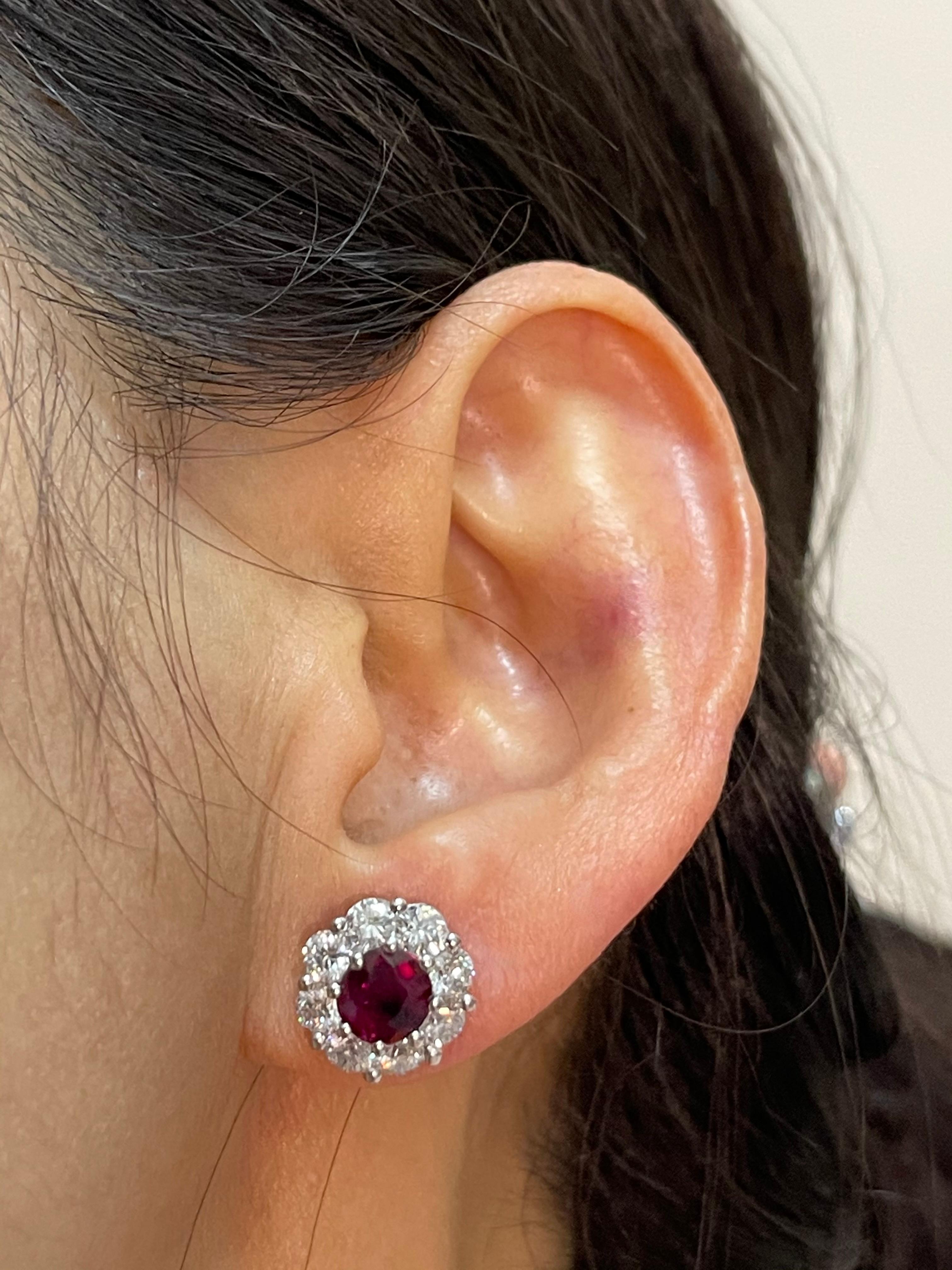 Please check out the HD video. These earrings are certified pigeon's blood red color and they have a nice glow. Here is a fantastic vivid red Ruby and diamond earrings. This pair of Burma no heat ruby diamond earrings has a classic design. The