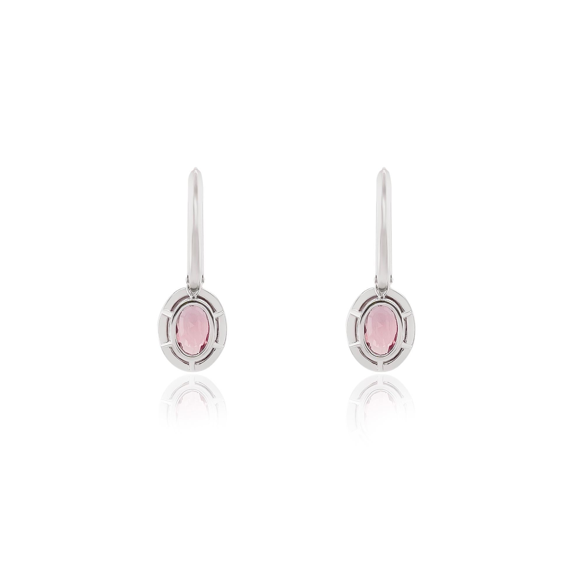 Padparadscha sapphires are considered one of the most sought after and most valuable gemstones in the world due to their limited availability. 

This very RARE perfectly matched pair of padparadscha sapphire earrings weight 2.01 cts and 2.02 cts.