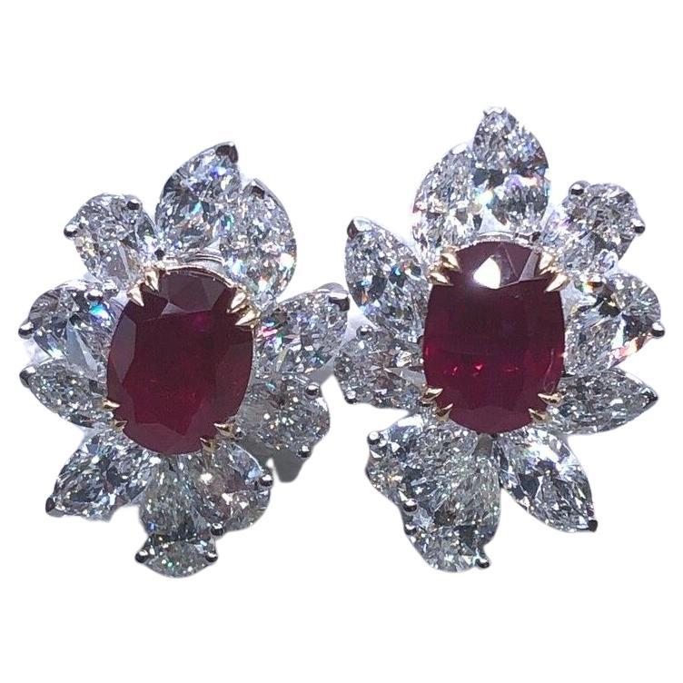 This stunning pair of original diamond earrings are handmade with exceptional care and very high quality rubies and diamonds. The earrings are gracefully domed and elegantly  Fine-made Burmese ruby and diamonds earrings with GRS certificates for