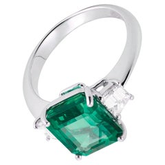 GIA Certified 3.66 Ct.  Emerald Trapezoid side Ring Minor Oil