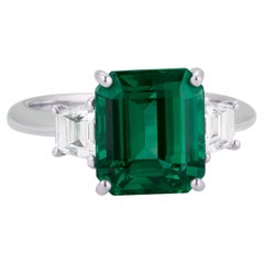 GRS Certified 4 Ct.  Emerald Trapezoid side Ring Minor Oil