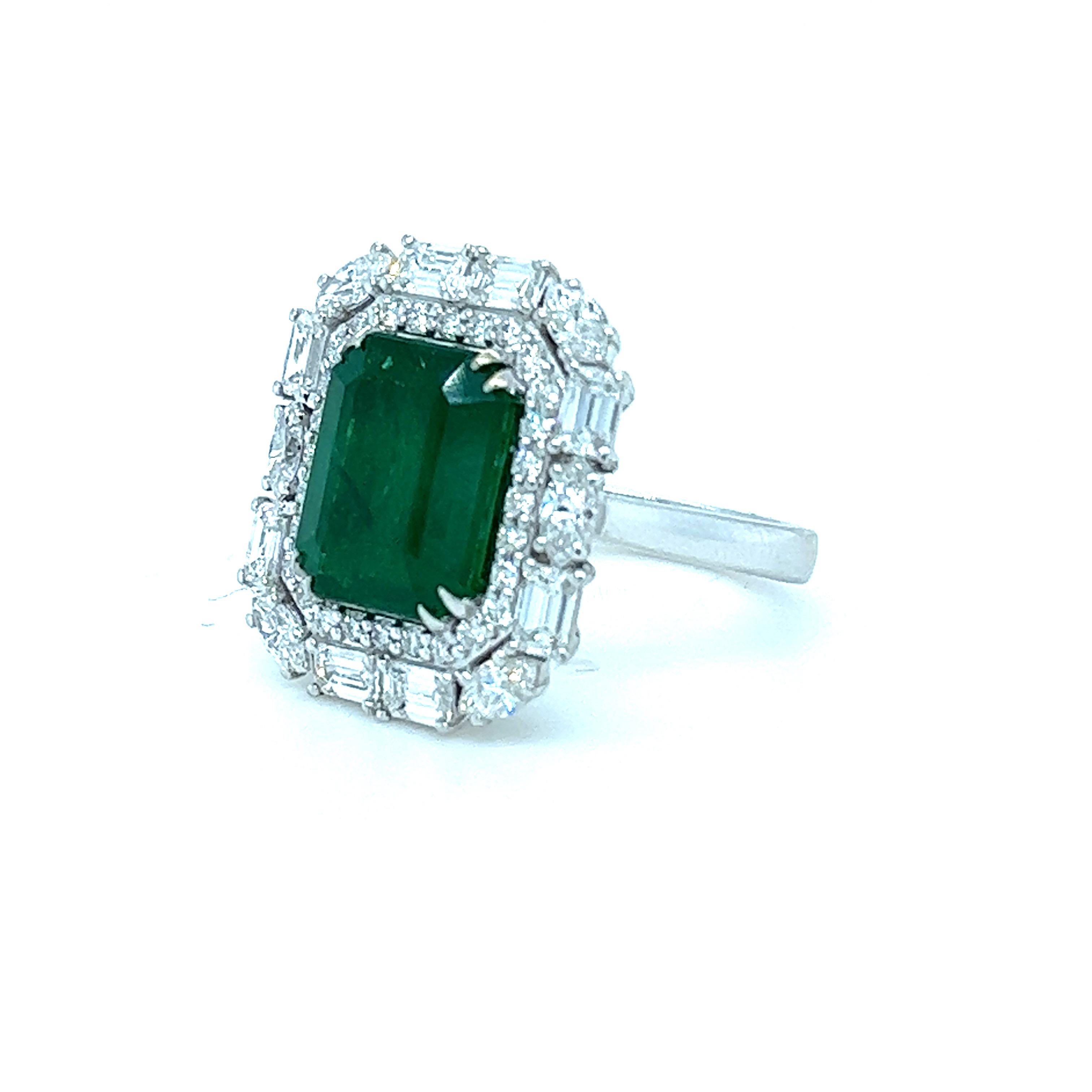 GRS Certified 4.44 Carat Emerald Cocktail Ring
 
DETAILS :

✦Gemstone : Emerald GRS Certified
✦ Type : Natural and Minor
✦ Shape : Emerald Cut
✦  Emerald Weight : 4.44 Cts
✦ Diamonds Vs F/G

Marquise : 0.52 Cts
Emerald : 0.96 Cts
Rounds : 0.28 Cts
✦