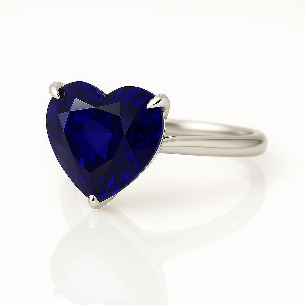 Cette exceptionnelle bague en platine met en valeur un rare saphir naturel de 4,46 carats certifié GRS, taillé en cœur.
Le saphir, originaire de Madagascar, présente une couleur bleue vive et riche, sans aucune indication de traitement thermique -