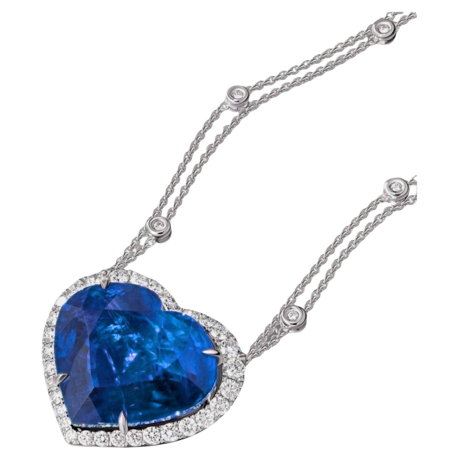 an extraordinary collection that features an exceptional 4.46carat vivid blue untreated sapphire as the main stone, surrounded by exquisite all-round diamonds graded D-E color and VVS clarity, all set in luxurious 18K white gold. This stunning