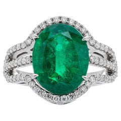 Bague en or blanc 18 carats certifiée GRS avec émeraude de 4,50 carats et diamant de 0,50 carat