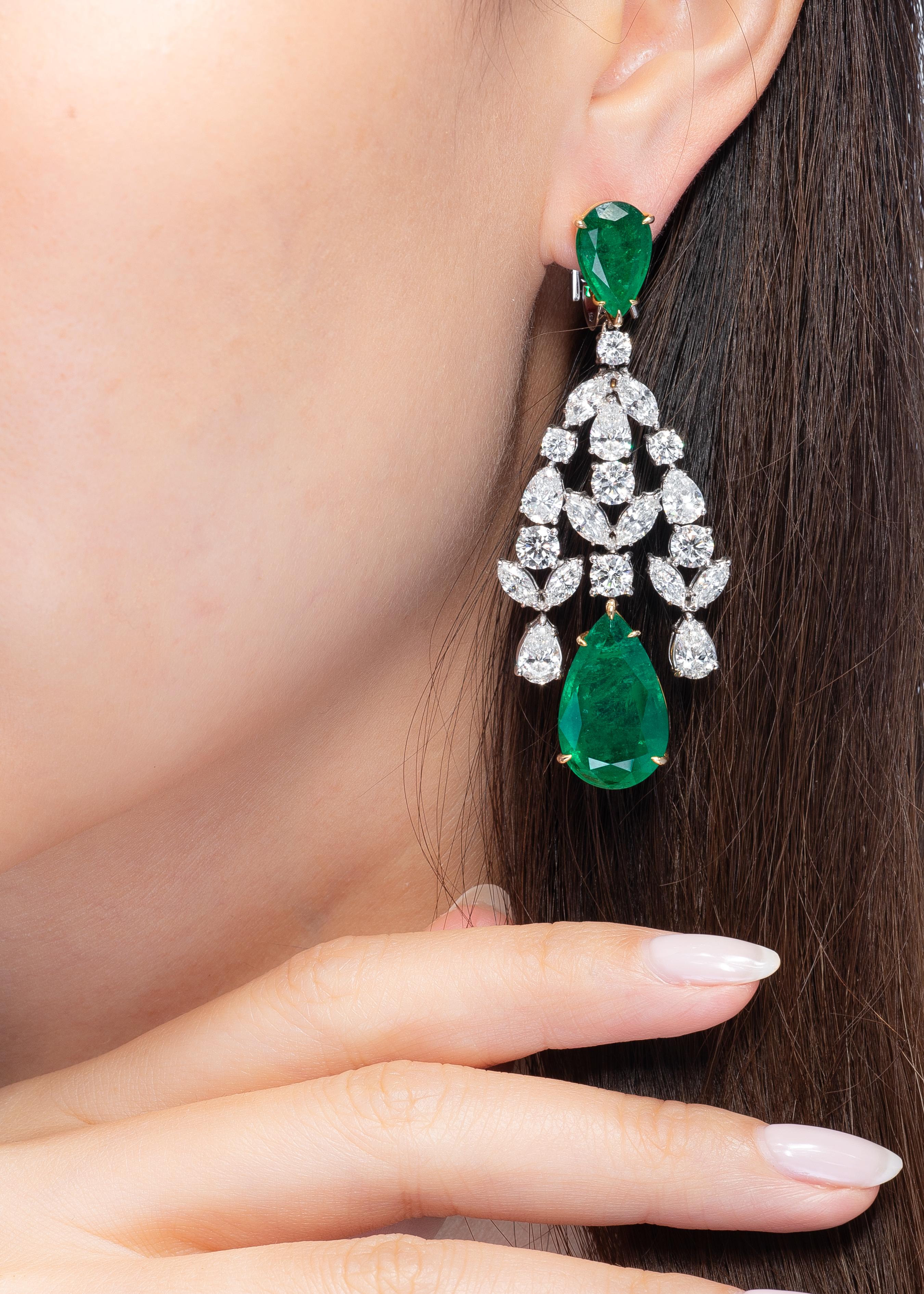 This exquisite pair of Vihari Jewels chandelier earrings feature four pear shaped Zambian Emeralds totaling 32.52 carats. GRS Report #2014-104562 certifies the Emeralds to have insignificant oil. The emeralds are accompanied with pear, round and