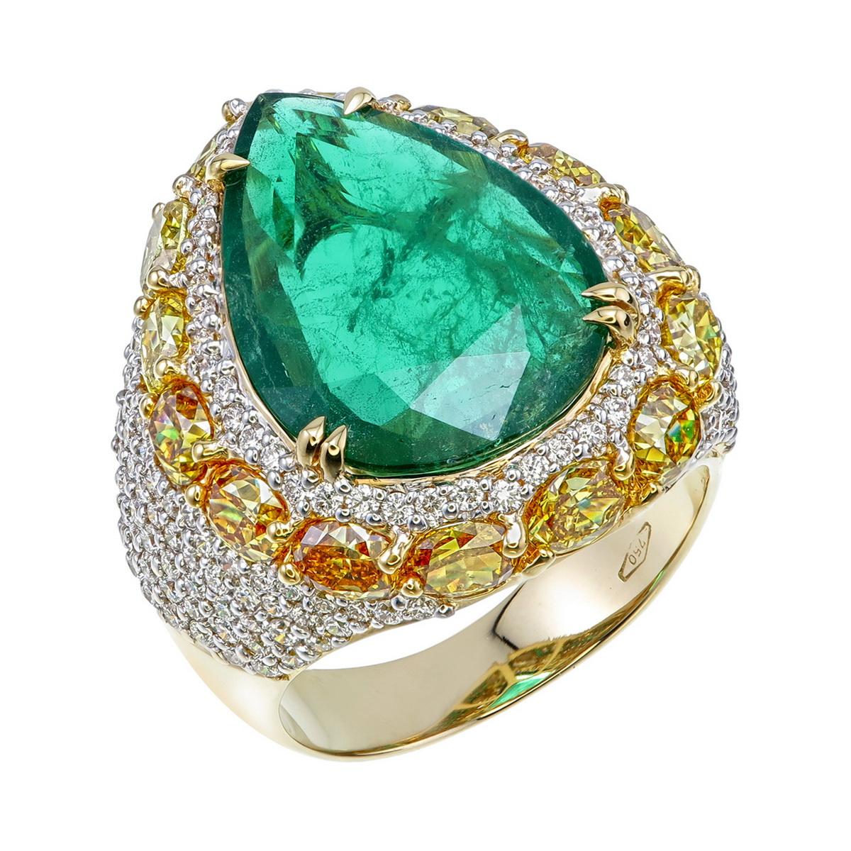Introducing this GRS Certified 4.95 Carat Zambian Emerald and Diamond Ring, a one-of-a-kind creation that embodies sophistication and exceptional craftsmanship. The centerpiece of this remarkable piece is a 4.95-carat pear-shaped emerald, sourced