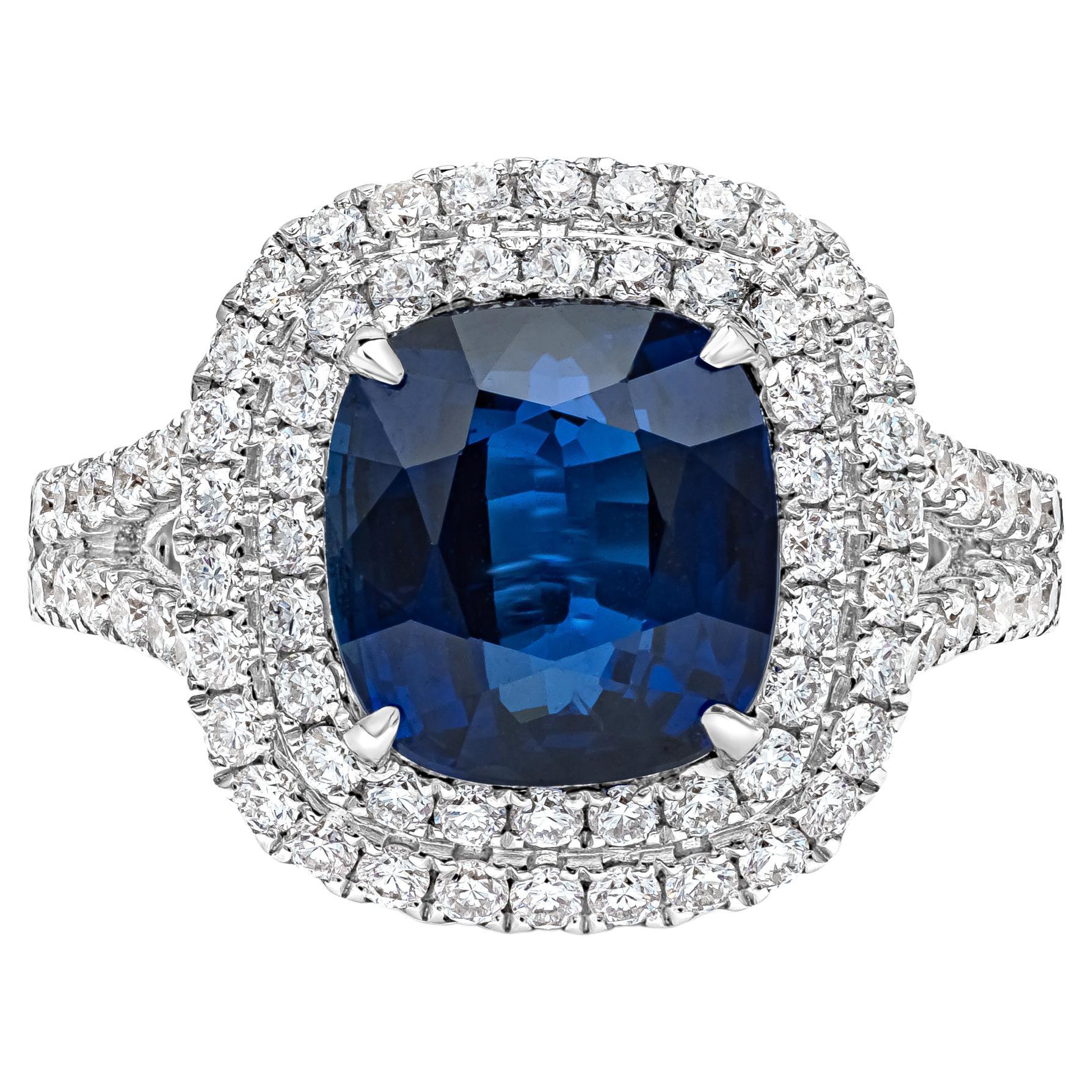 Verlobungsring mit 5,05 Karat blauem Saphir im Kissenschliff und Diamant-Halo