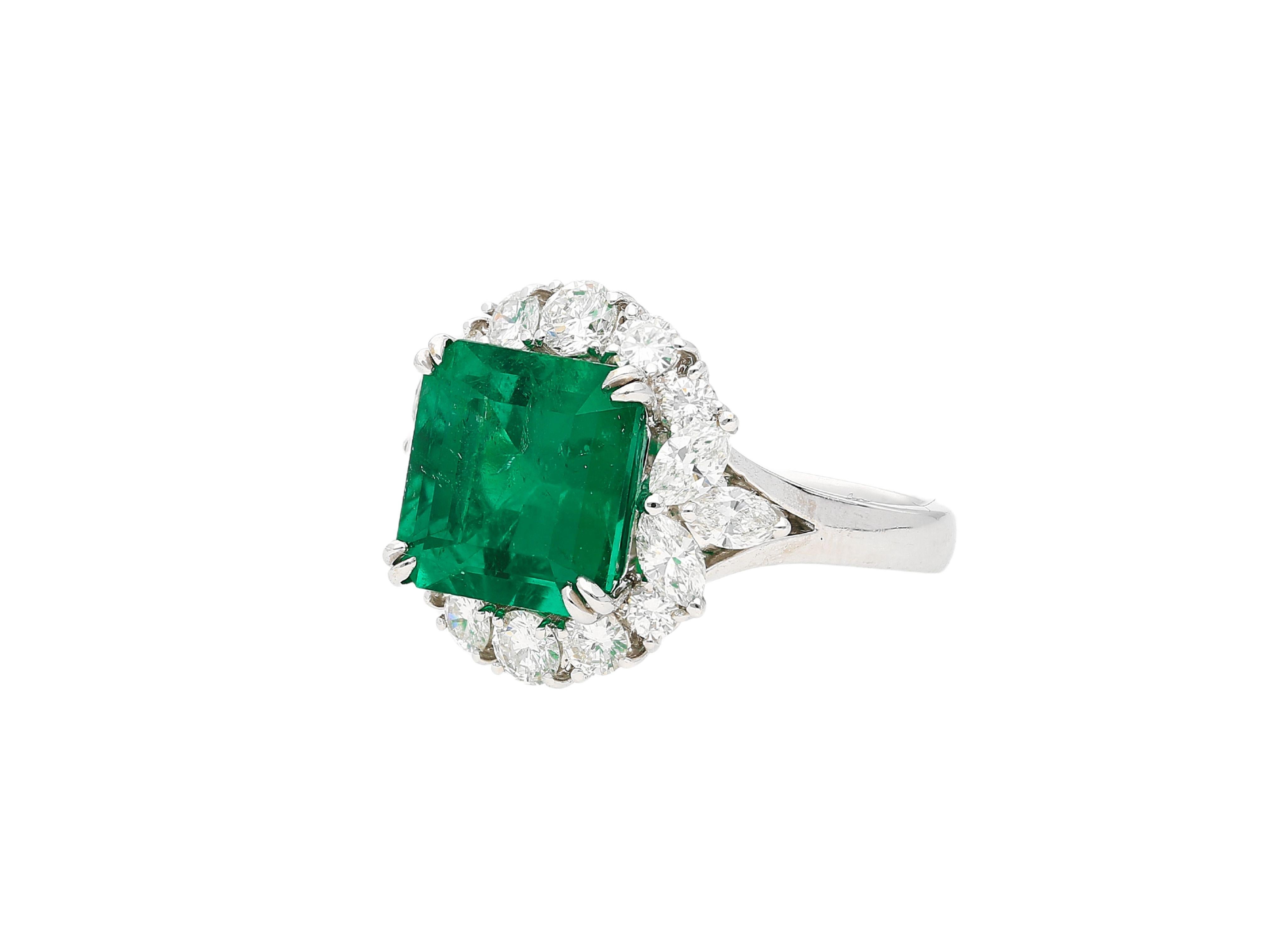 Magnificent 5.20 carat Emerald of Colombian origin. This Emerald bears excellent color, transparency, and luster. All while having minor oil treatment. An extremely rare gem considering its over 5-carat weight. The legendary Emerald center stone is