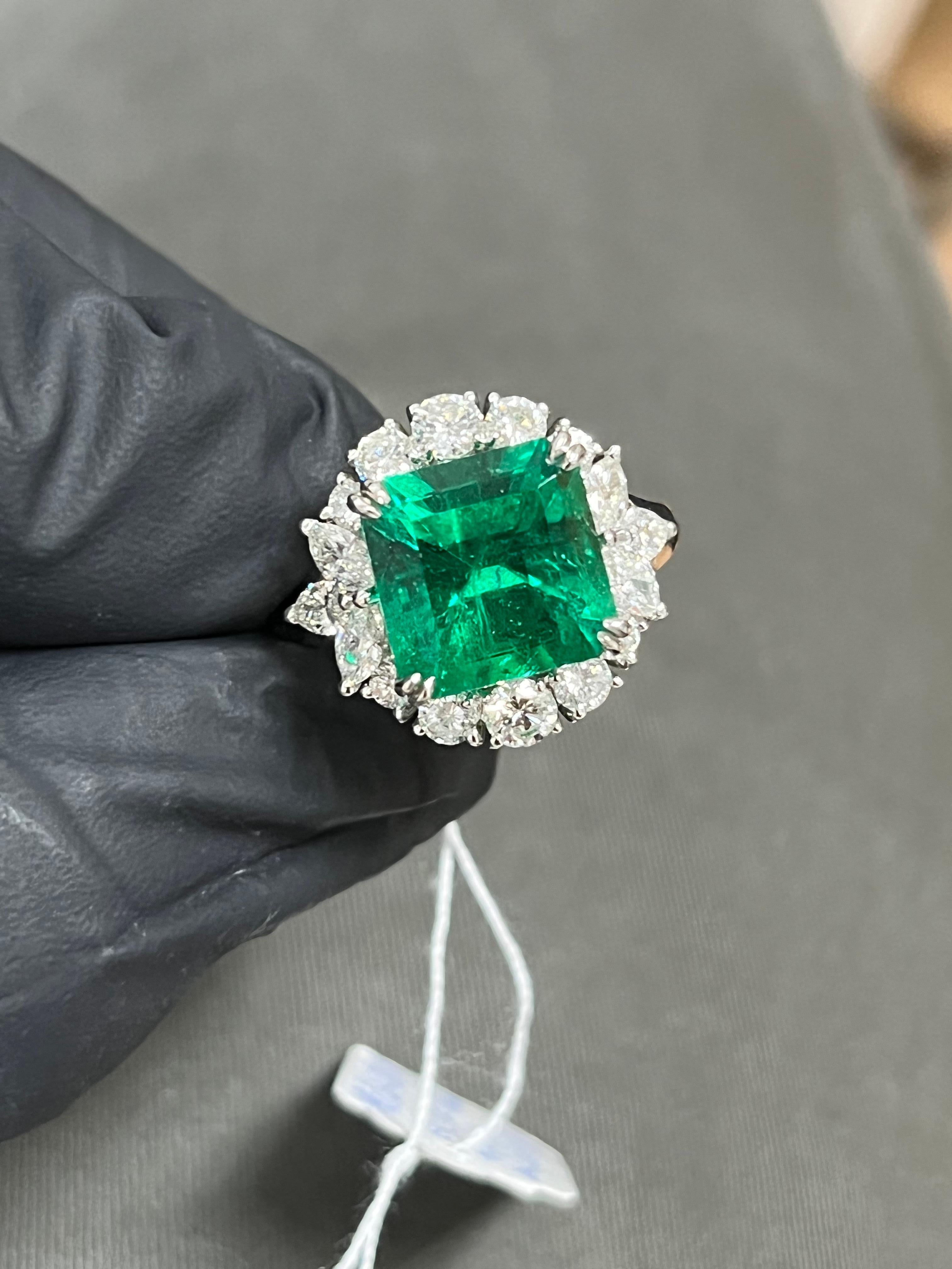 Emerald Cut GRS Certified 5.20 Carat Minor Oil Colombian Emerald and Diamond Halo Ring For Sale