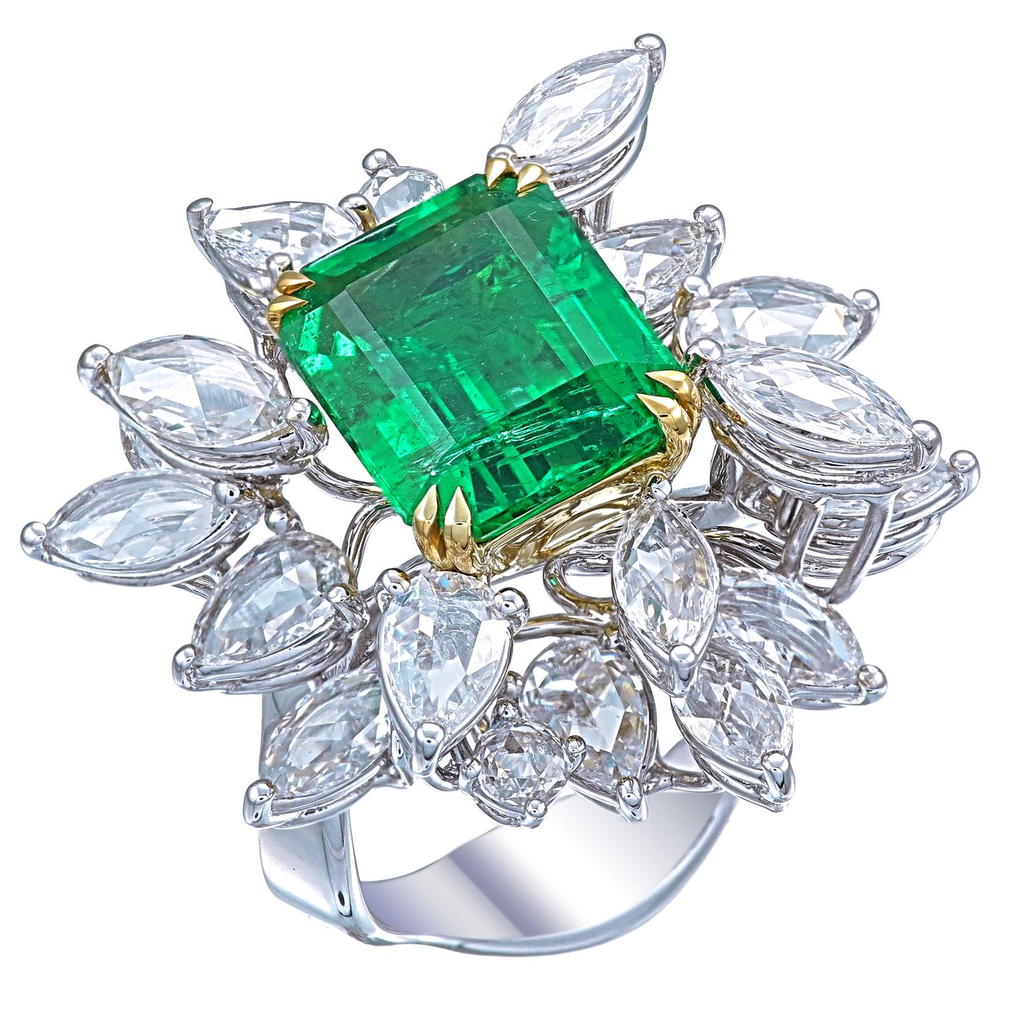 Bereiten Sie sich darauf vor, von diesem aufsehenerregenden Ring mit einem atemberaubenden 5,32-Karat-Smaragd aus Sambia, der von der GRS für seine außergewöhnliche Farbe und hohe Qualität zertifiziert wurde, verzaubert zu werden. Der satte grüne